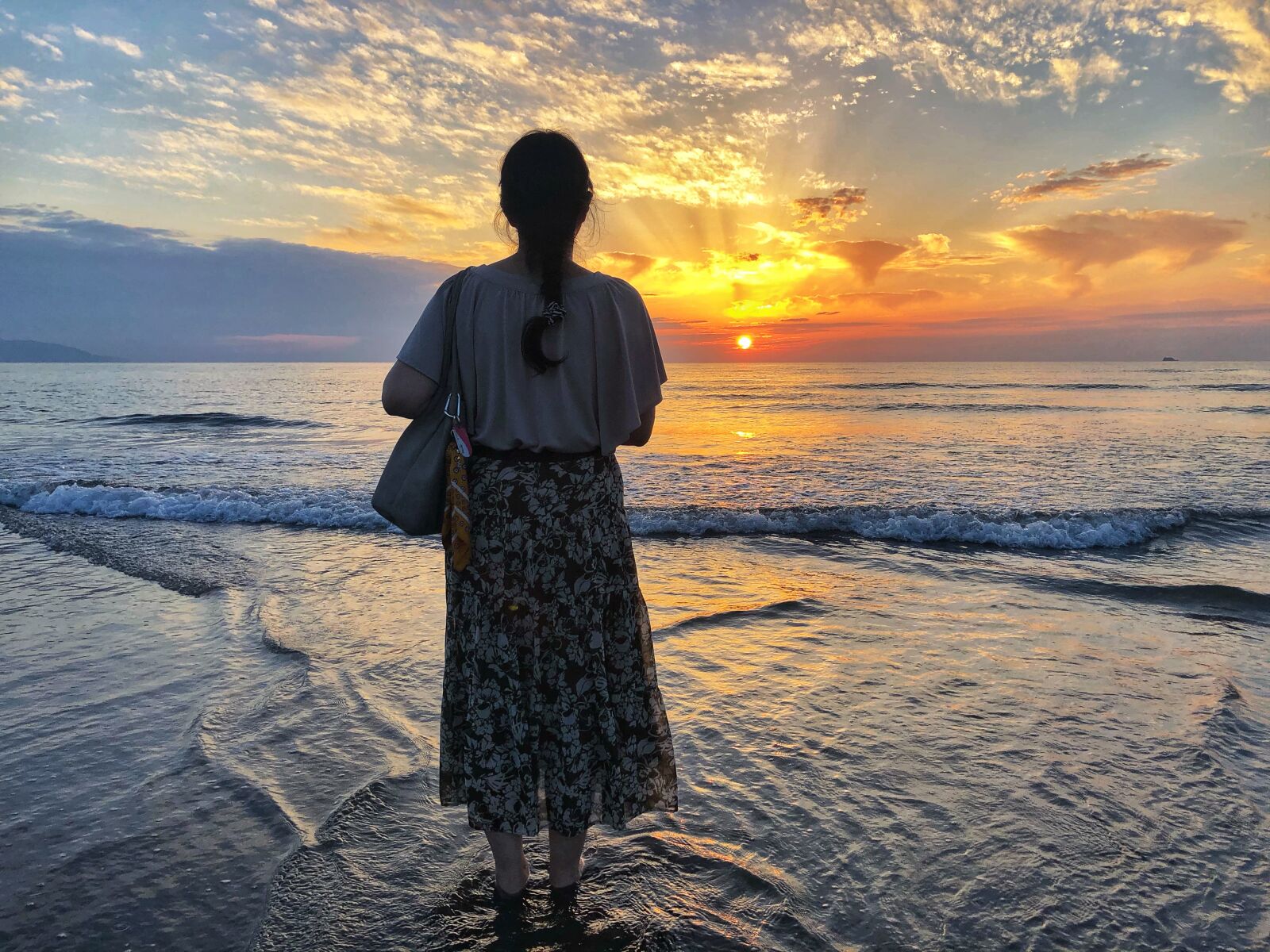 Apple iPhone 8 Plus + iPhone 8 Plus back dual camera 3.99mm f/1.8 sample photo. Woman, sunset, silhouette photography