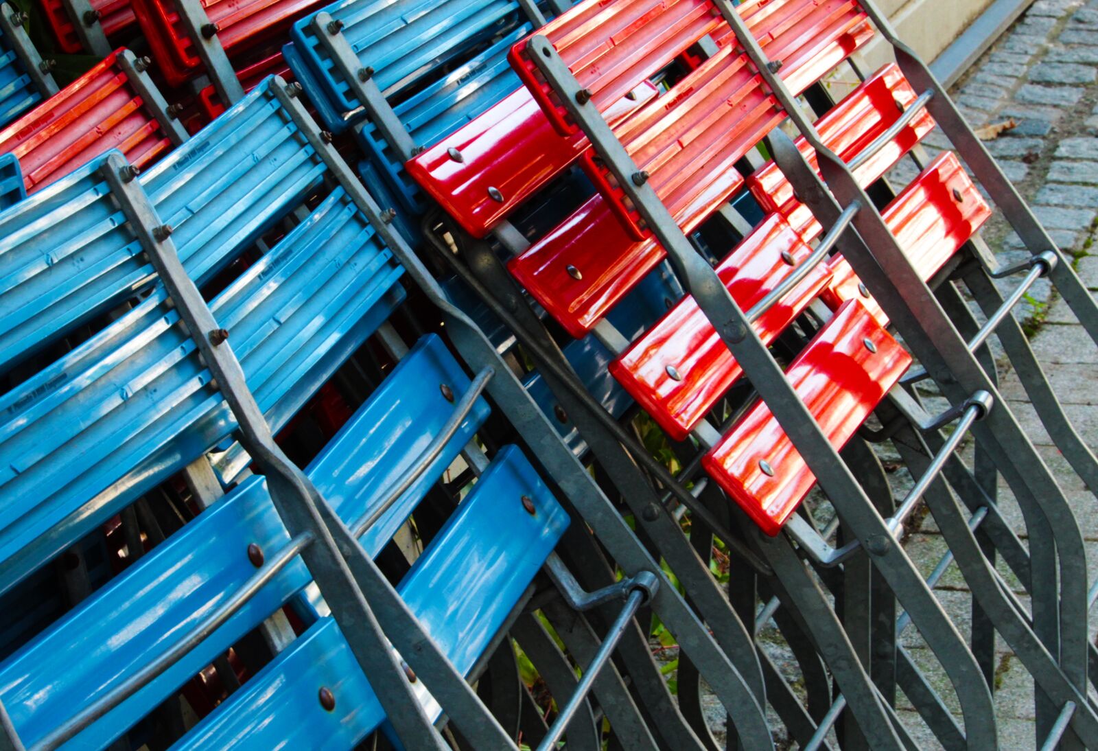 Canon EF-S 55-250mm F4-5.6 IS STM sample photo. Plastic chairs, folding chairs photography