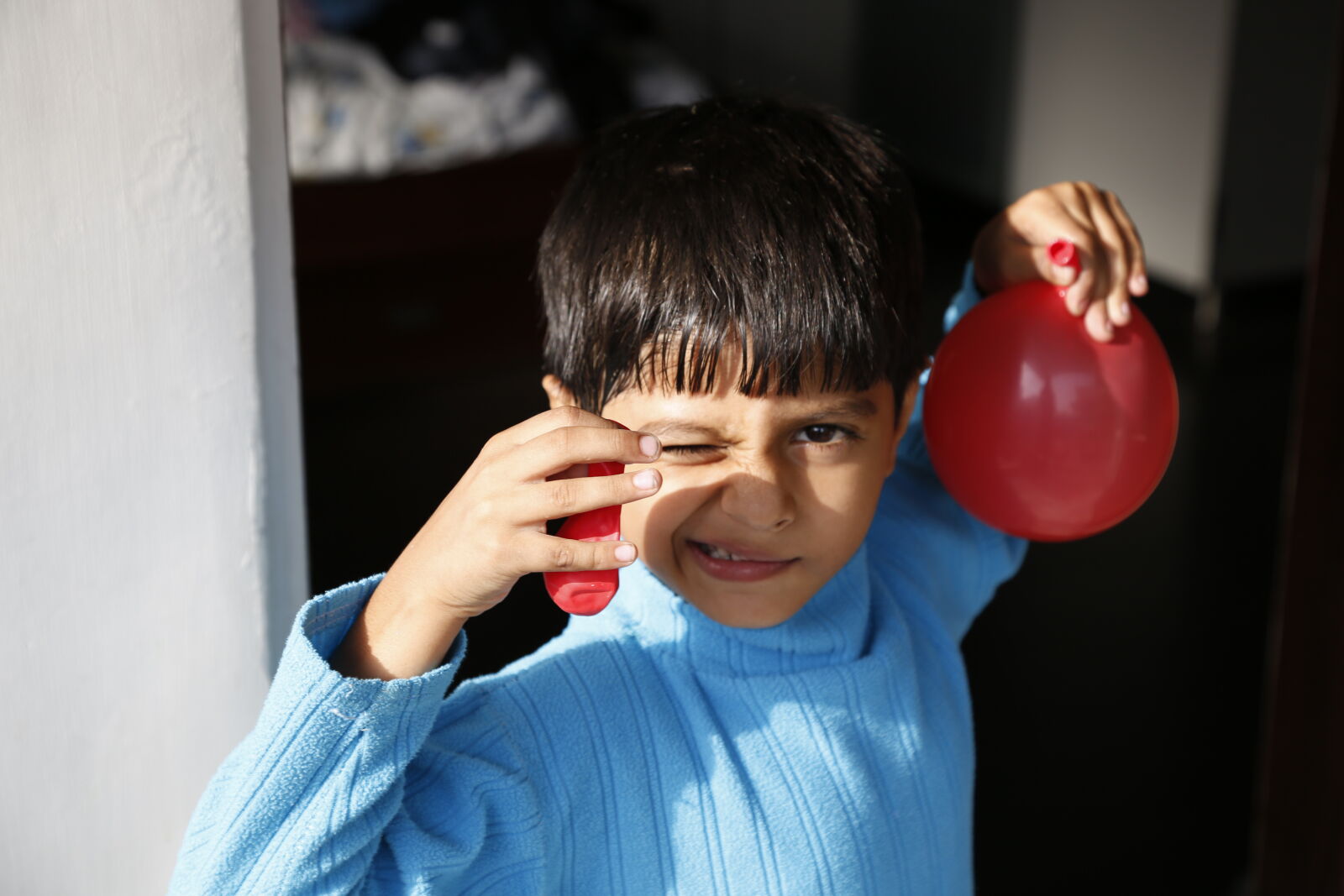 Canon EF 24-105mm F4L IS USM sample photo. Balloon, blue, boy, expression photography