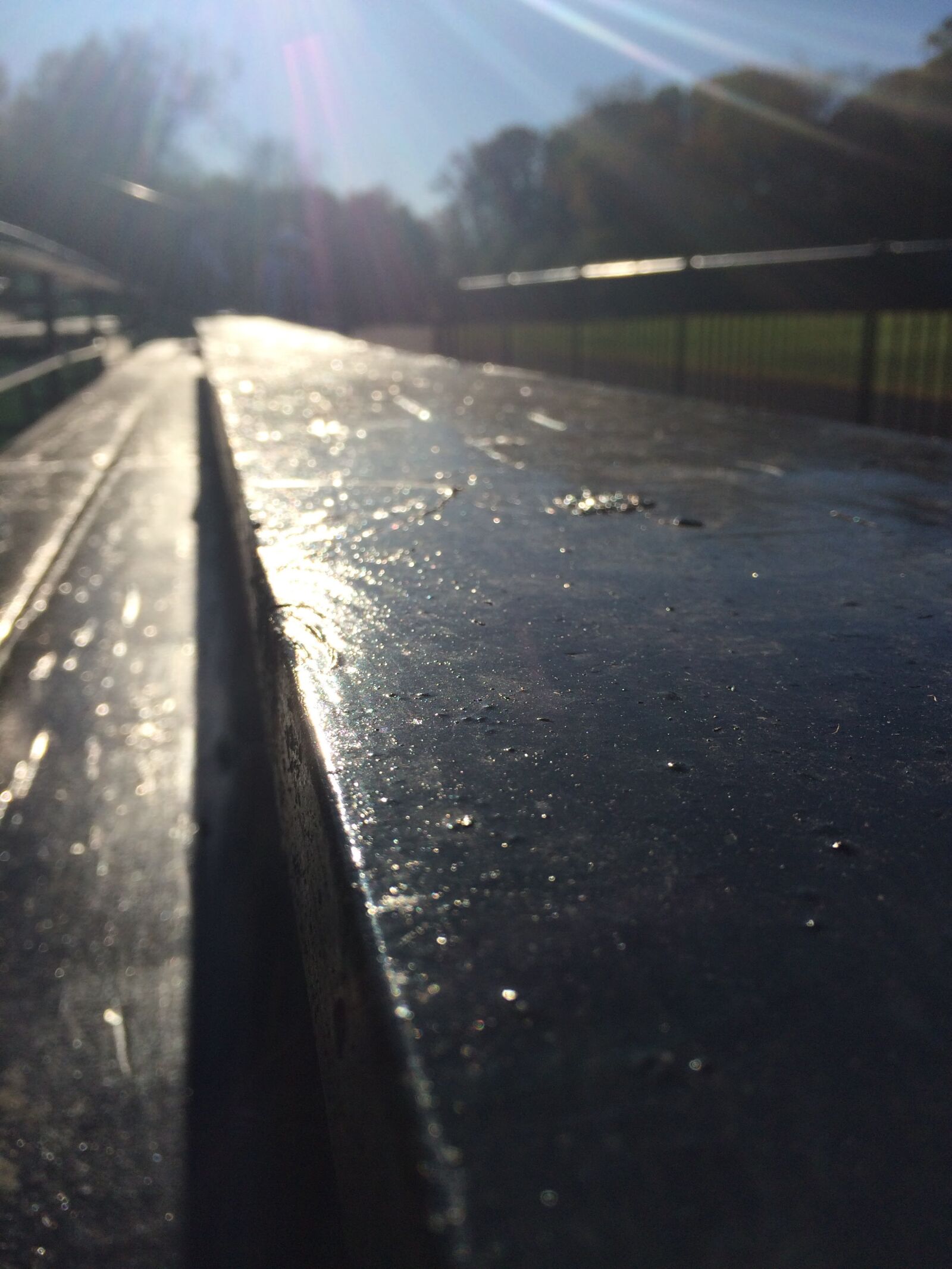 iPhone 5s back camera 4.15mm f/2.2 sample photo. Bench, black, bleachers, day photography
