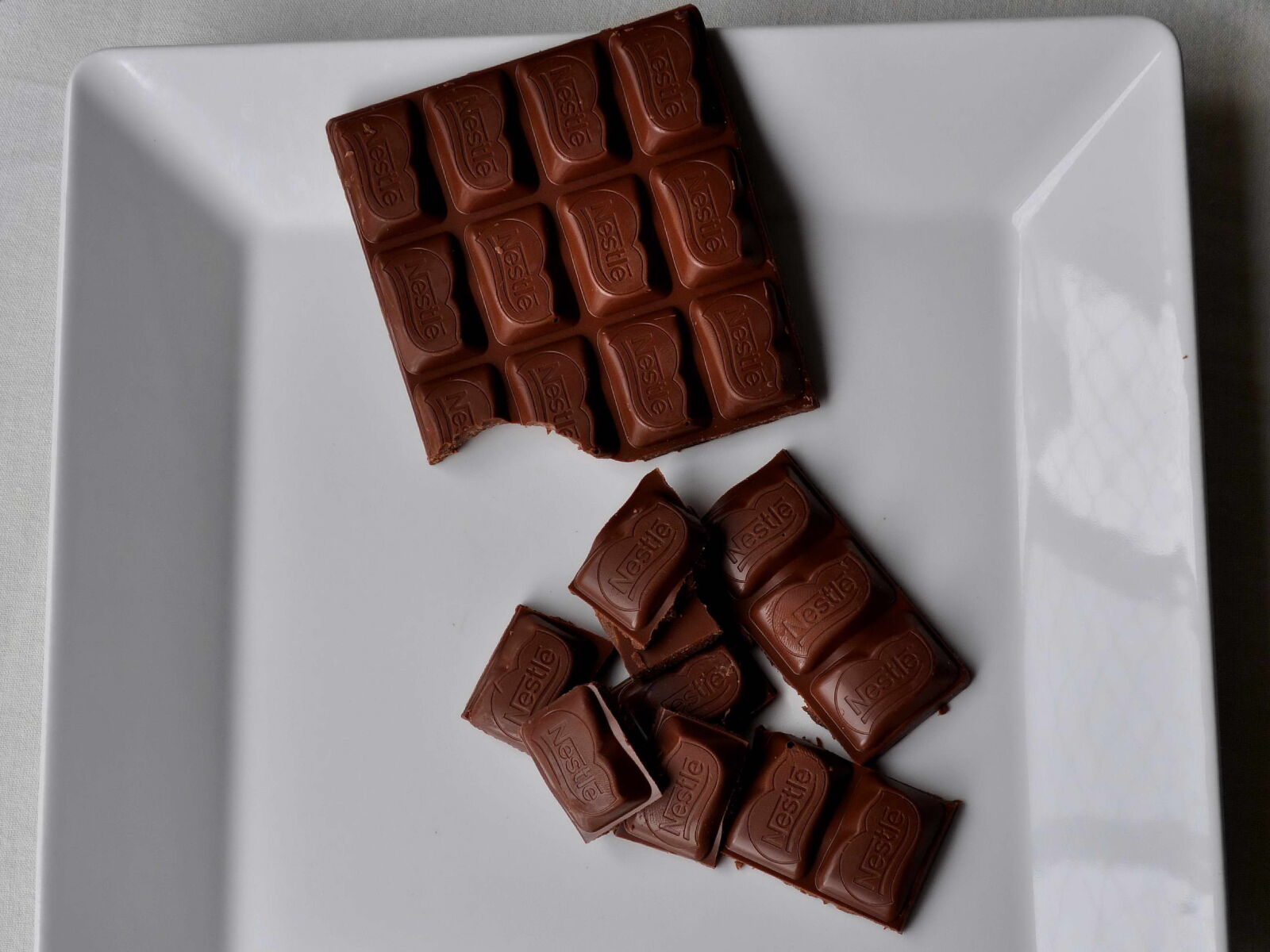 Nikon D5000 sample photo. Swiss, chocolate, plate photography