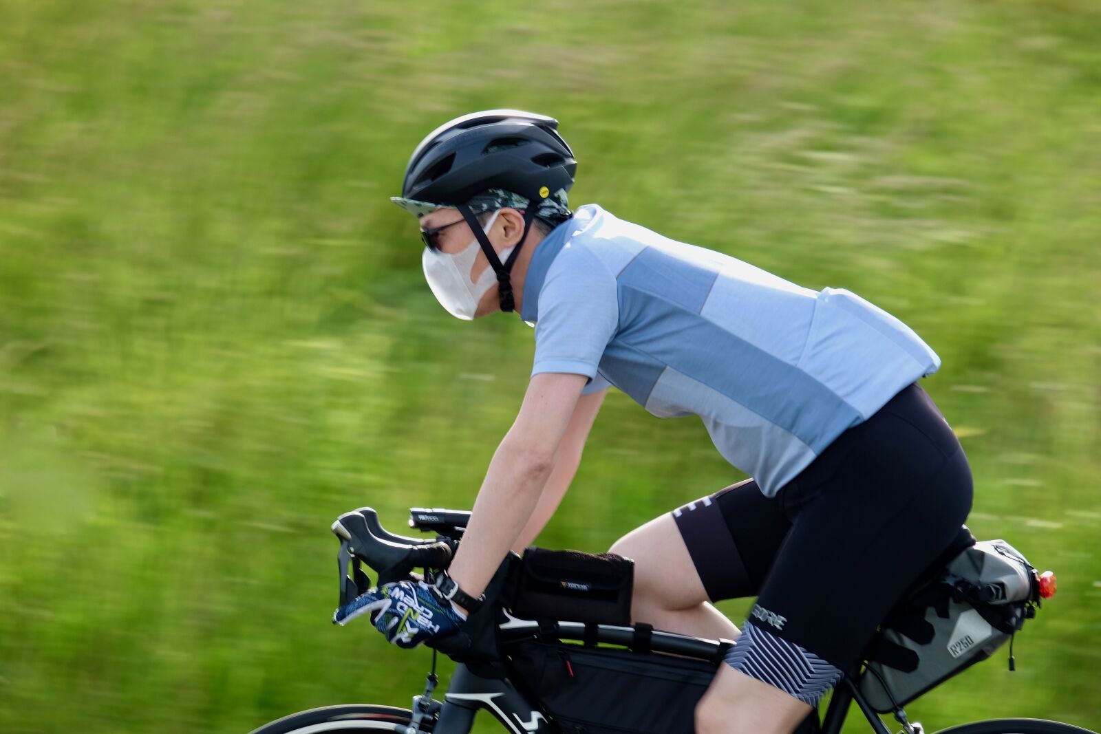 Fujifilm XF 55-200mm F3.5-4.8 R LM OIS sample photo. Rider, man, bicycle photography