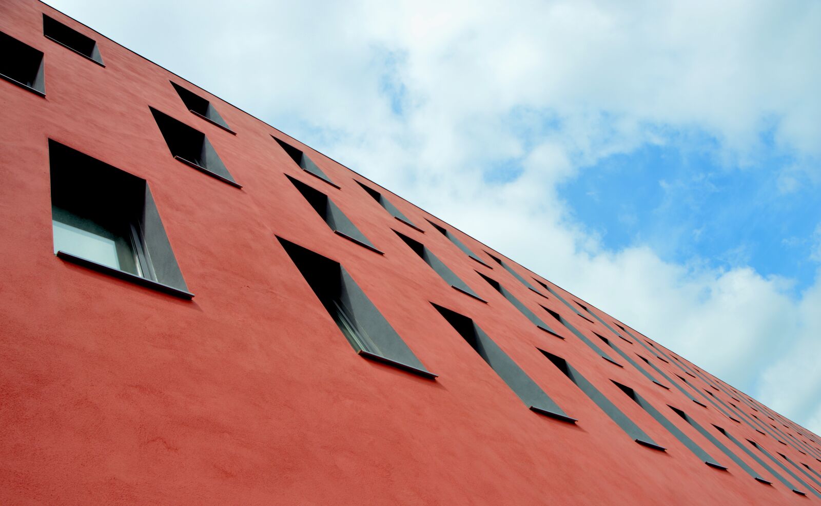 Nikon D3200 sample photo. Building, clouds, perspective photography