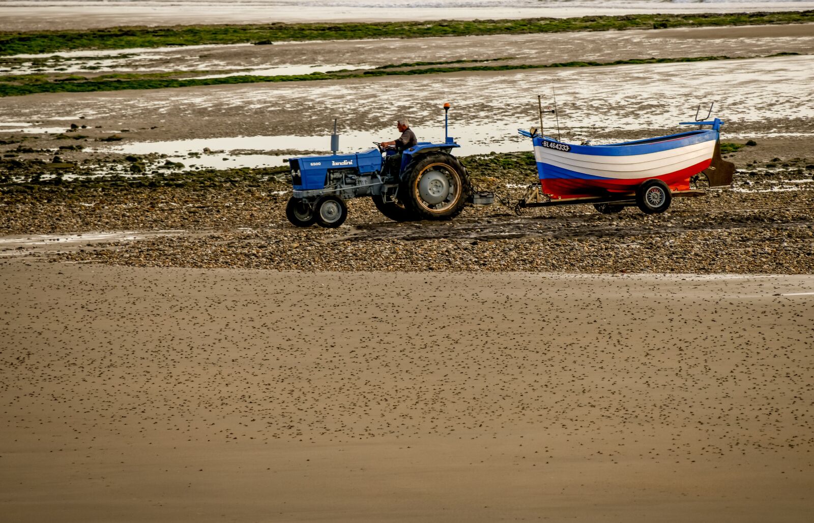Tamron 28-300mm F3.5-6.3 Di VC PZD sample photo. Tractor, boat, sea photography