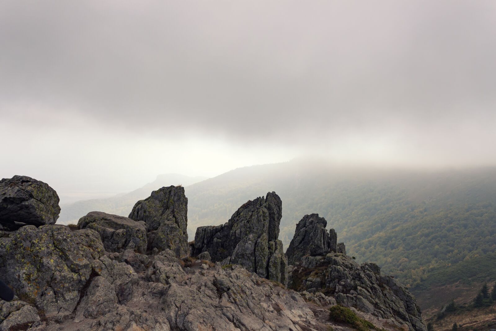 Canon EF-S 18-55mm F3.5-5.6 IS sample photo. Mountain peak, clouds, fog photography