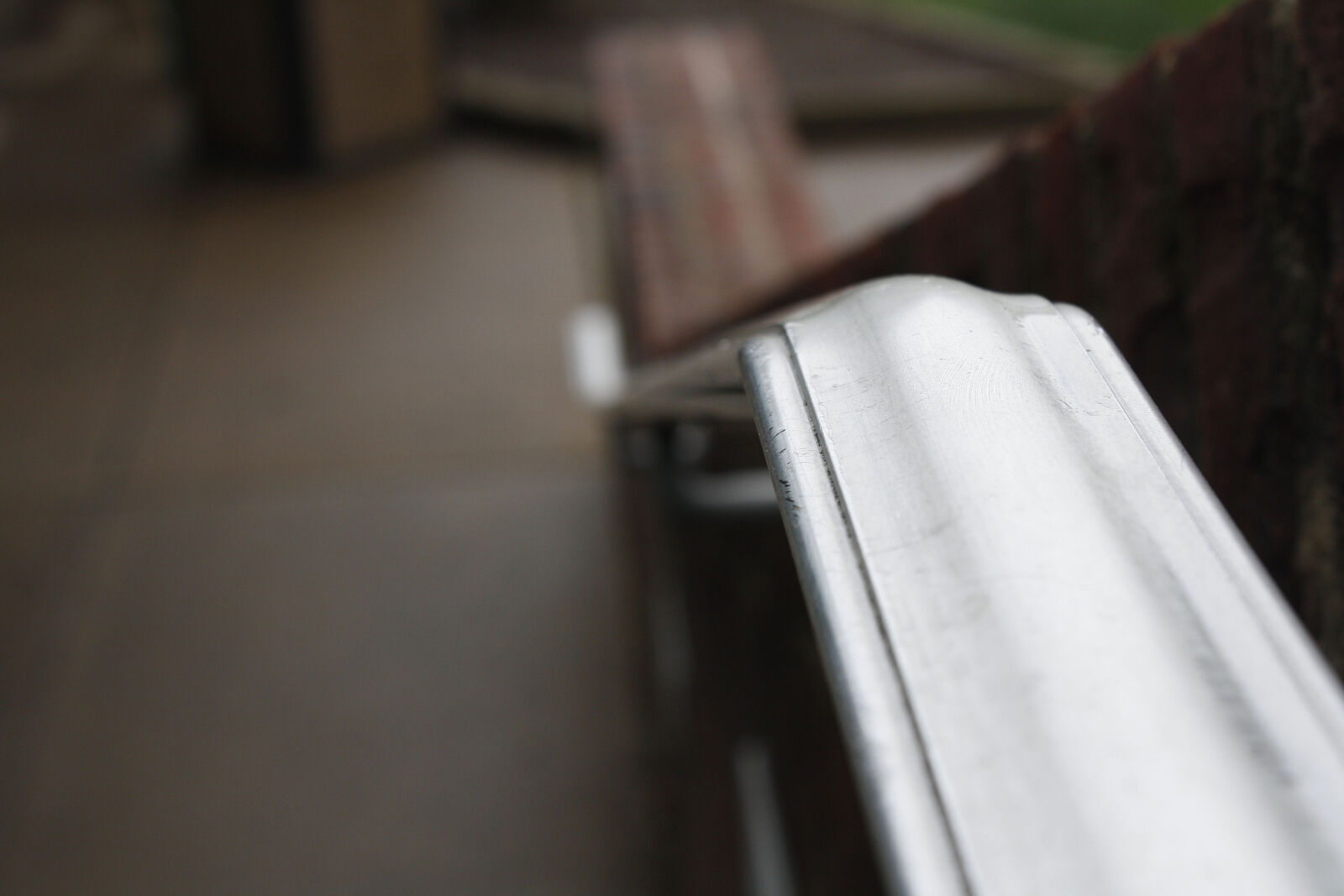 Canon EOS 1000D (EOS Digital Rebel XS / EOS Kiss F) sample photo. Brick, metal, movement, railing photography