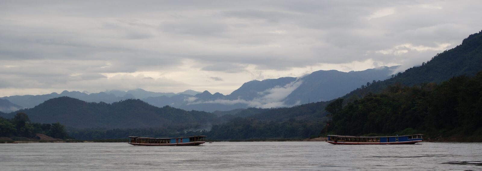 Sony Alpha DSLR-A230 sample photo. Mekong, boat, mountains photography