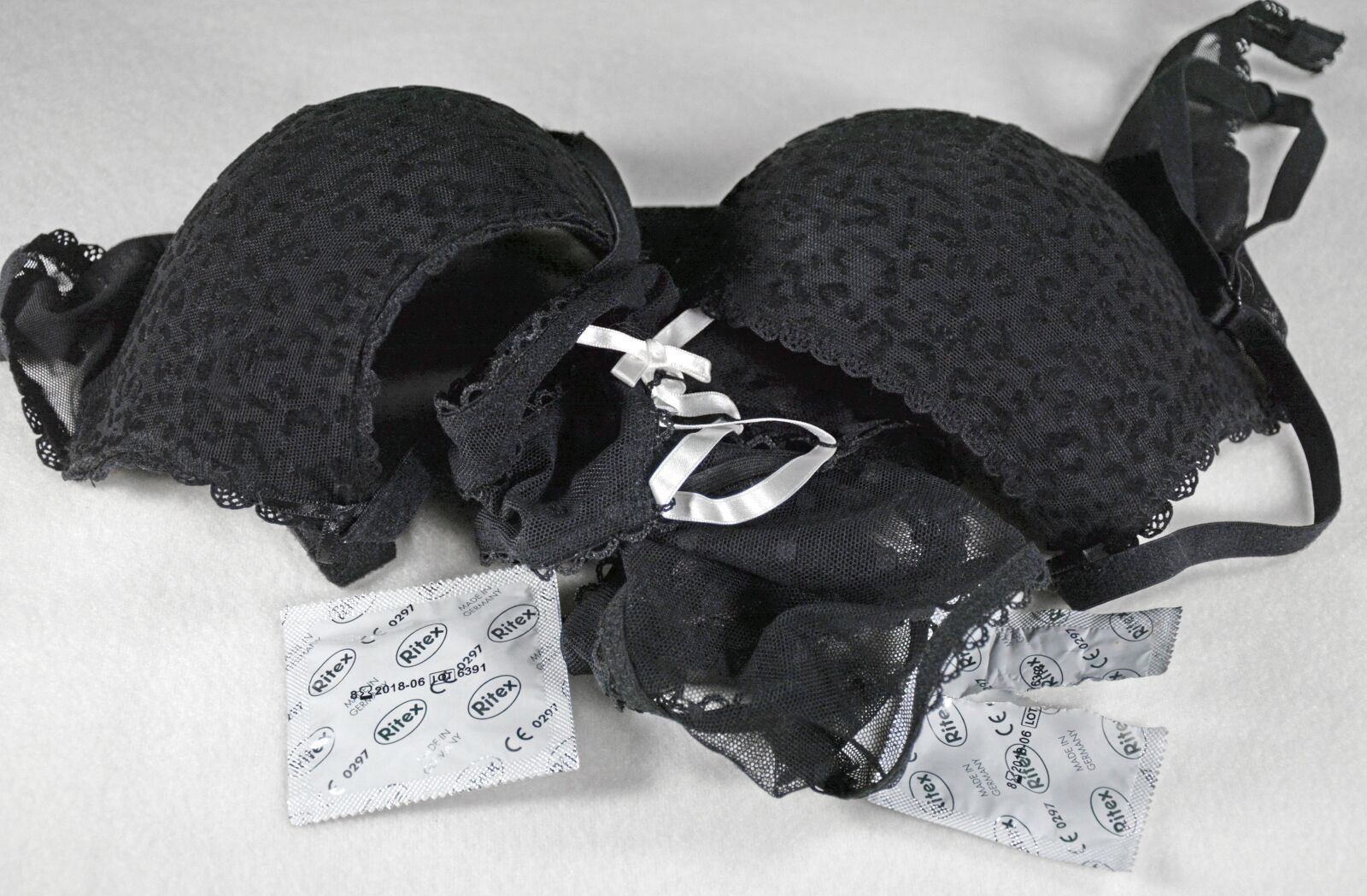 Nikon D5200 sample photo. Sex, condoms, condom photography