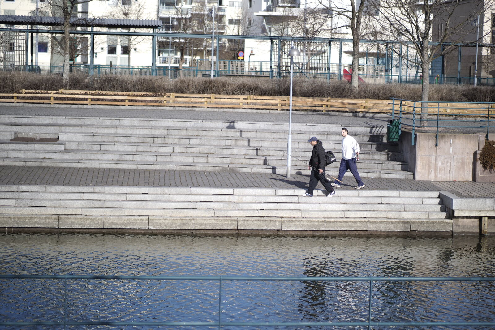 Panasonic Leica DG Nocticron 42.5mm F1.2 ASPH OIS sample photo. Fishers by the canal photography