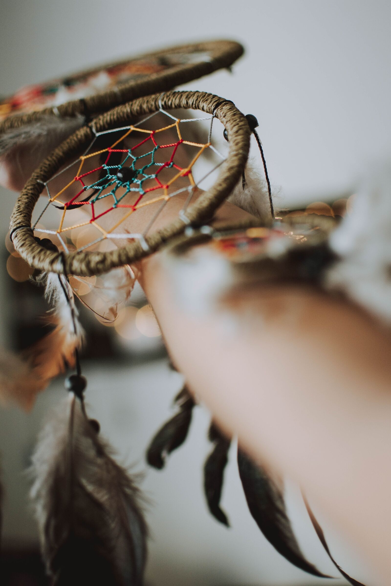 Nikon D5200 sample photo. Dream catcher, feather, arm photography
