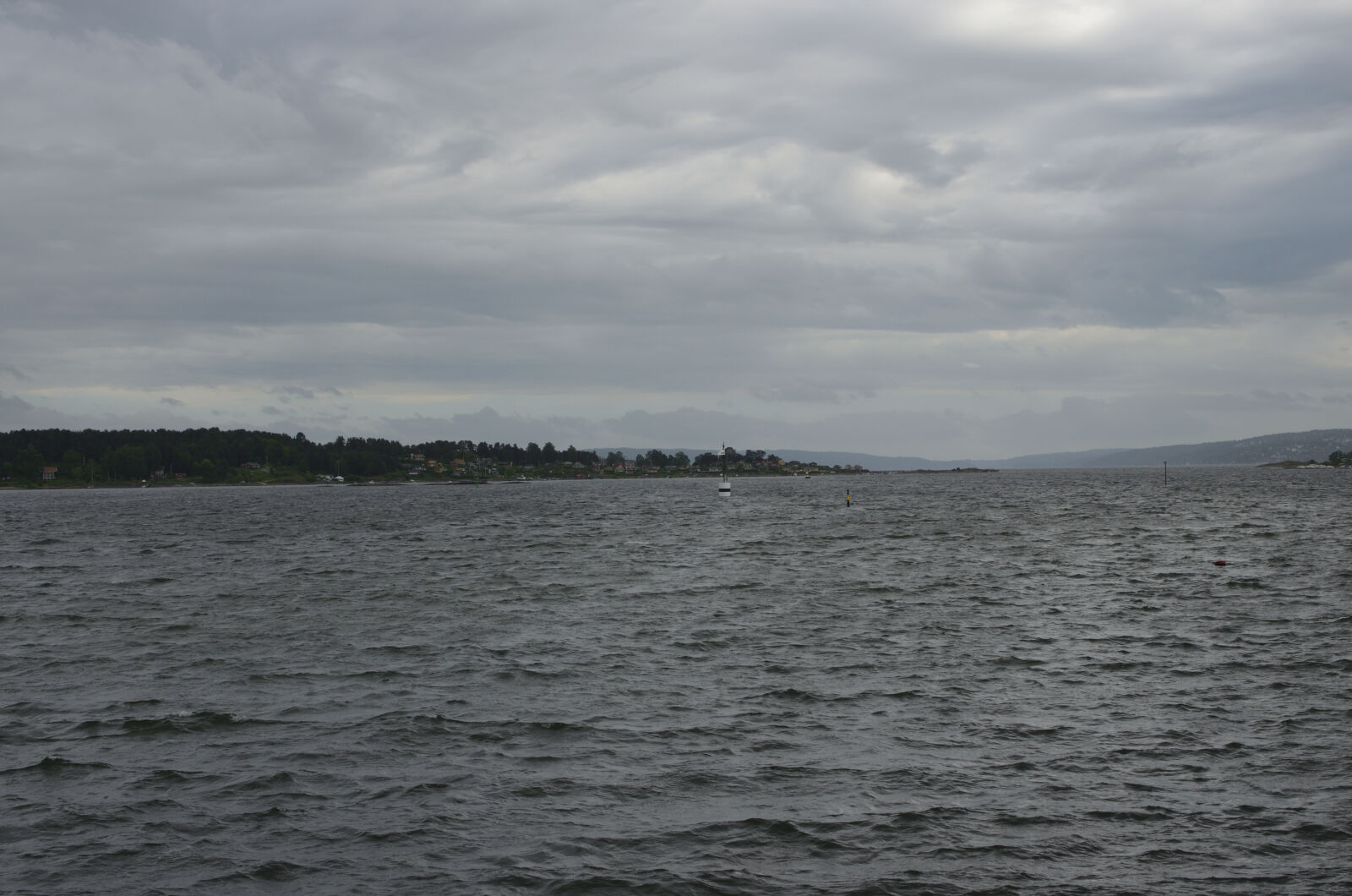 Nikon D5100 + Nikon AF-S DX Nikkor 35mm F1.8G sample photo. Cloudy, sky, oslo, fjord photography