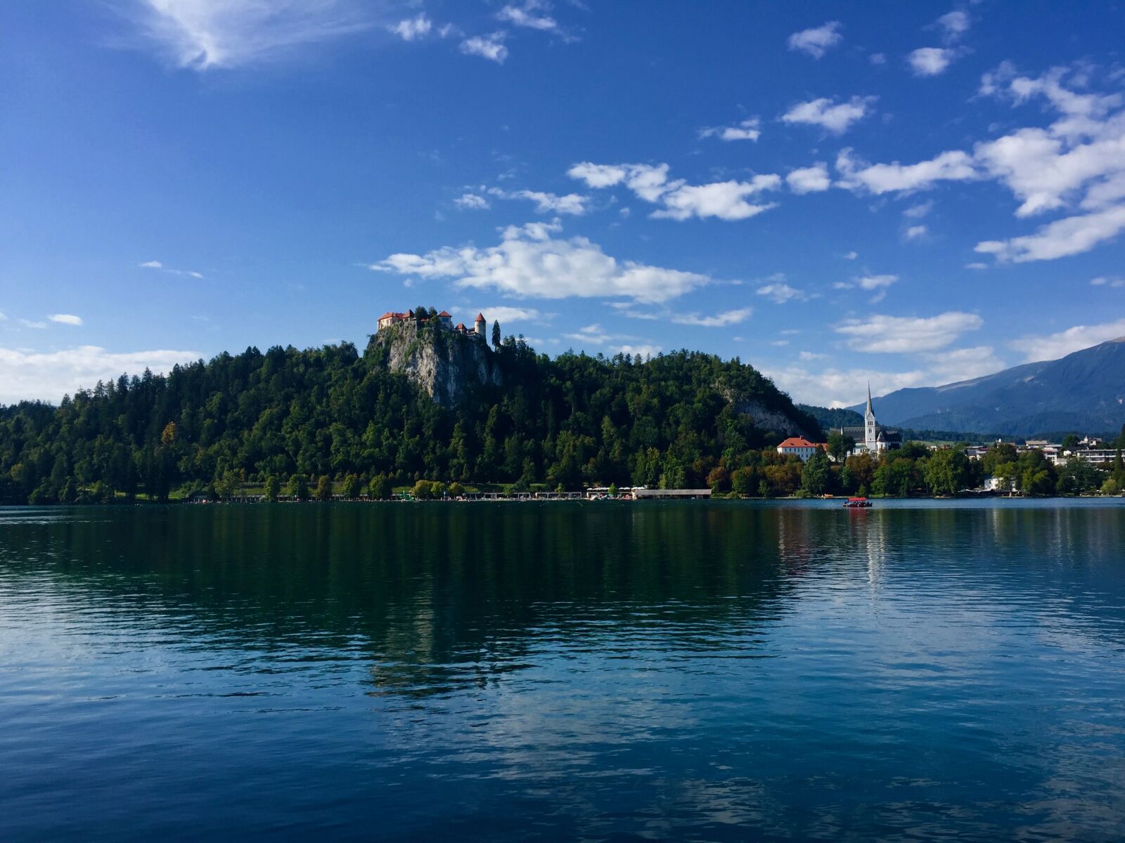 iPhone 6 back camera 4.15mm f/2.2 sample photo. Beautiful, castle, lake, mountain photography