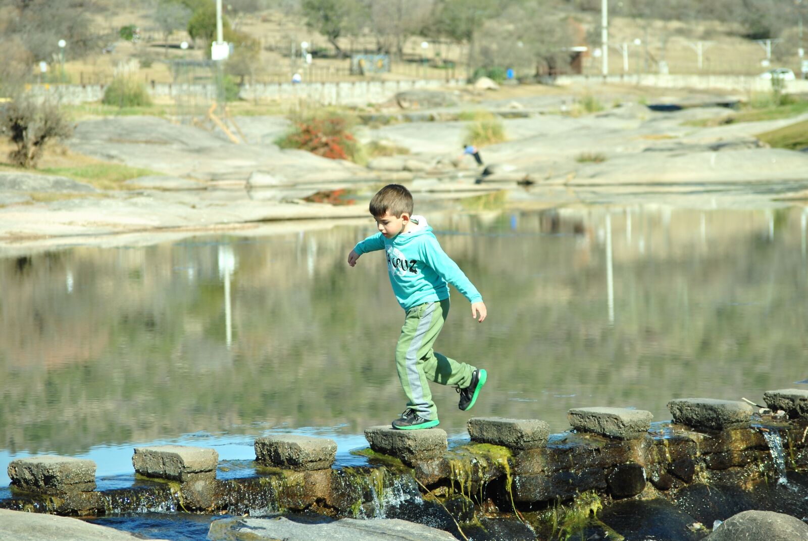 Nikon D3000 sample photo. Child, river, jump photography