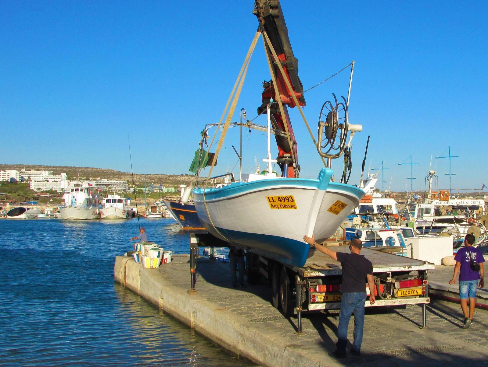 Canon PowerShot SX400 IS sample photo. Harbor, loading, boat photography