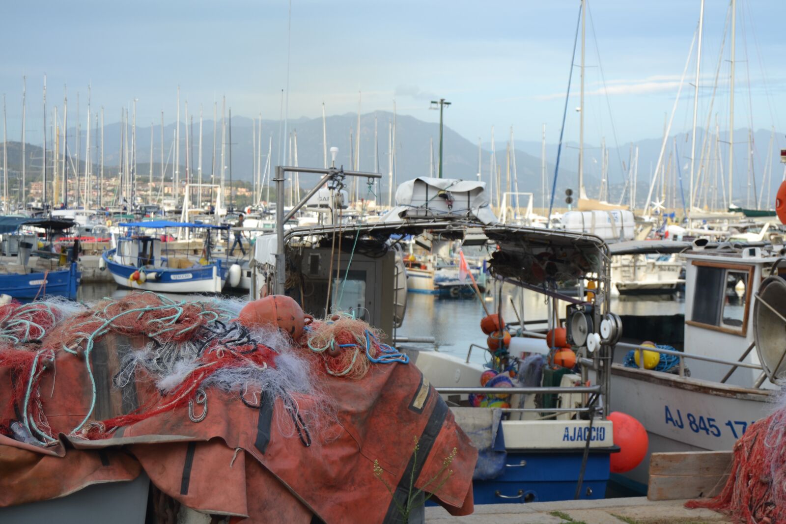 Nikon D3100 sample photo. Fishing net, port, dock photography