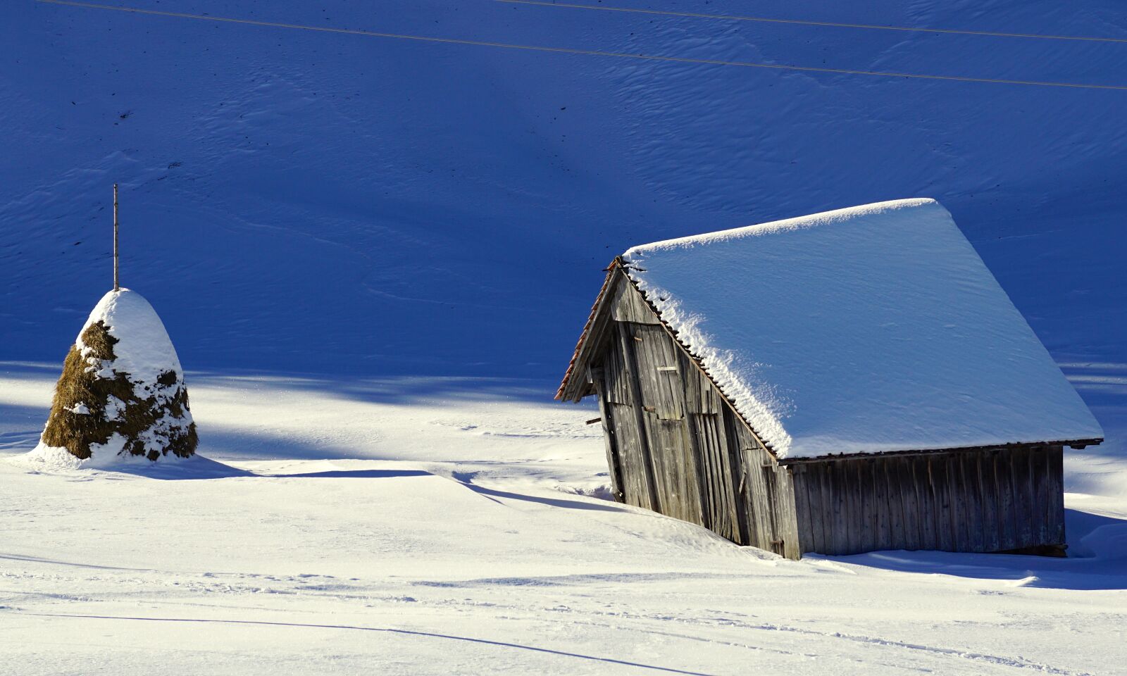 Sony DT 55-300mm F4.5-5.6 SAM sample photo. Winter, barn, snow photography