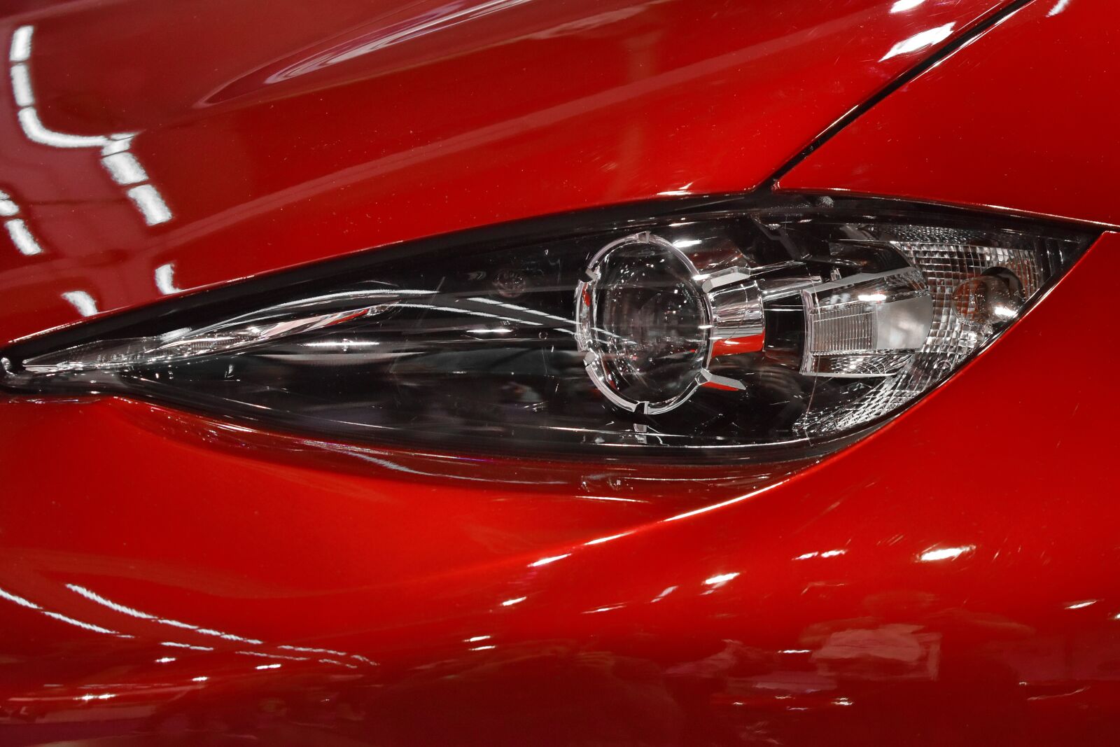 Nikon D5500 sample photo. Headlight, modern, red, sports photography