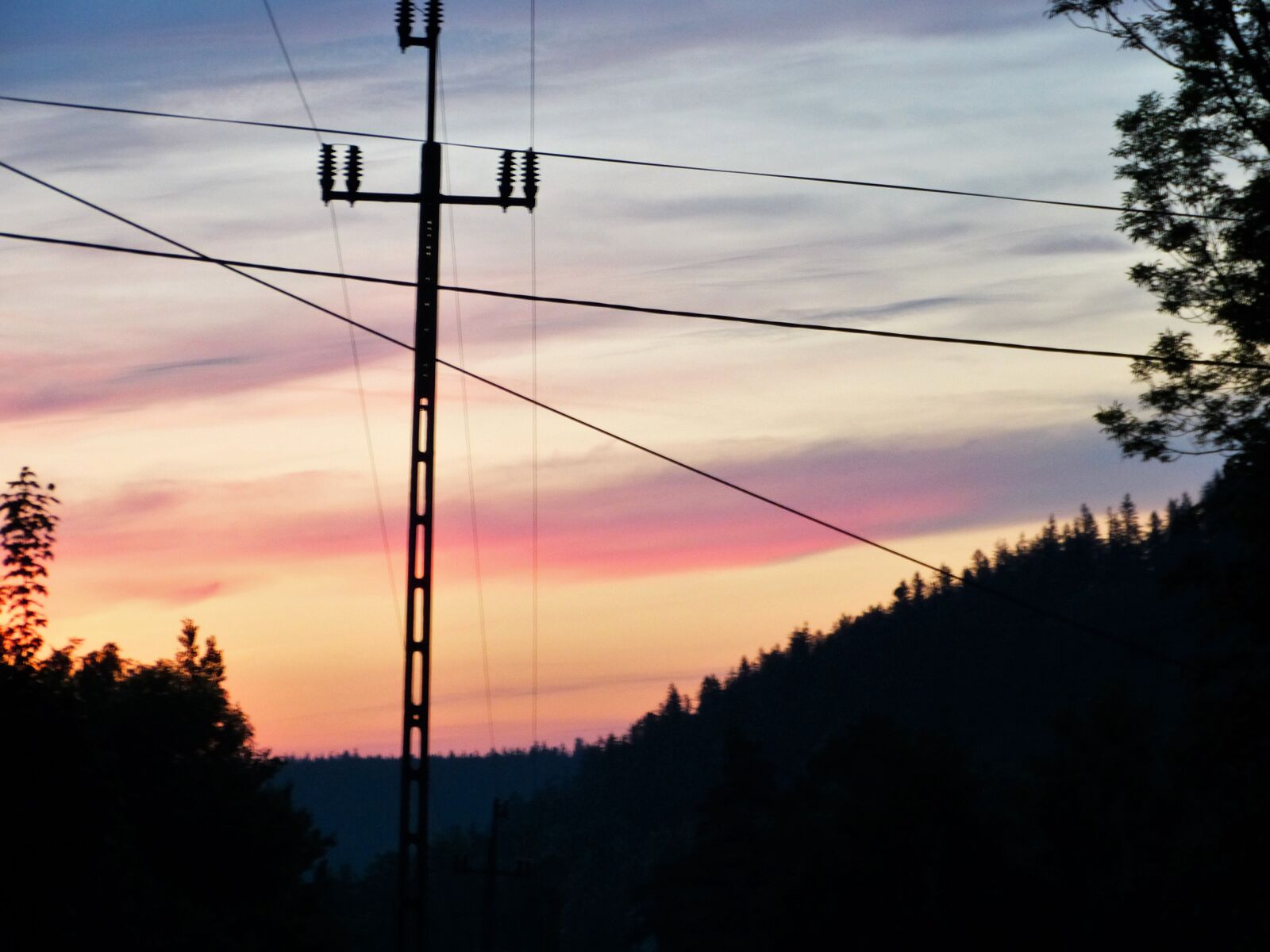 Panasonic Lumix DMC-FZ150 sample photo. Mountain, sunset, wires photography