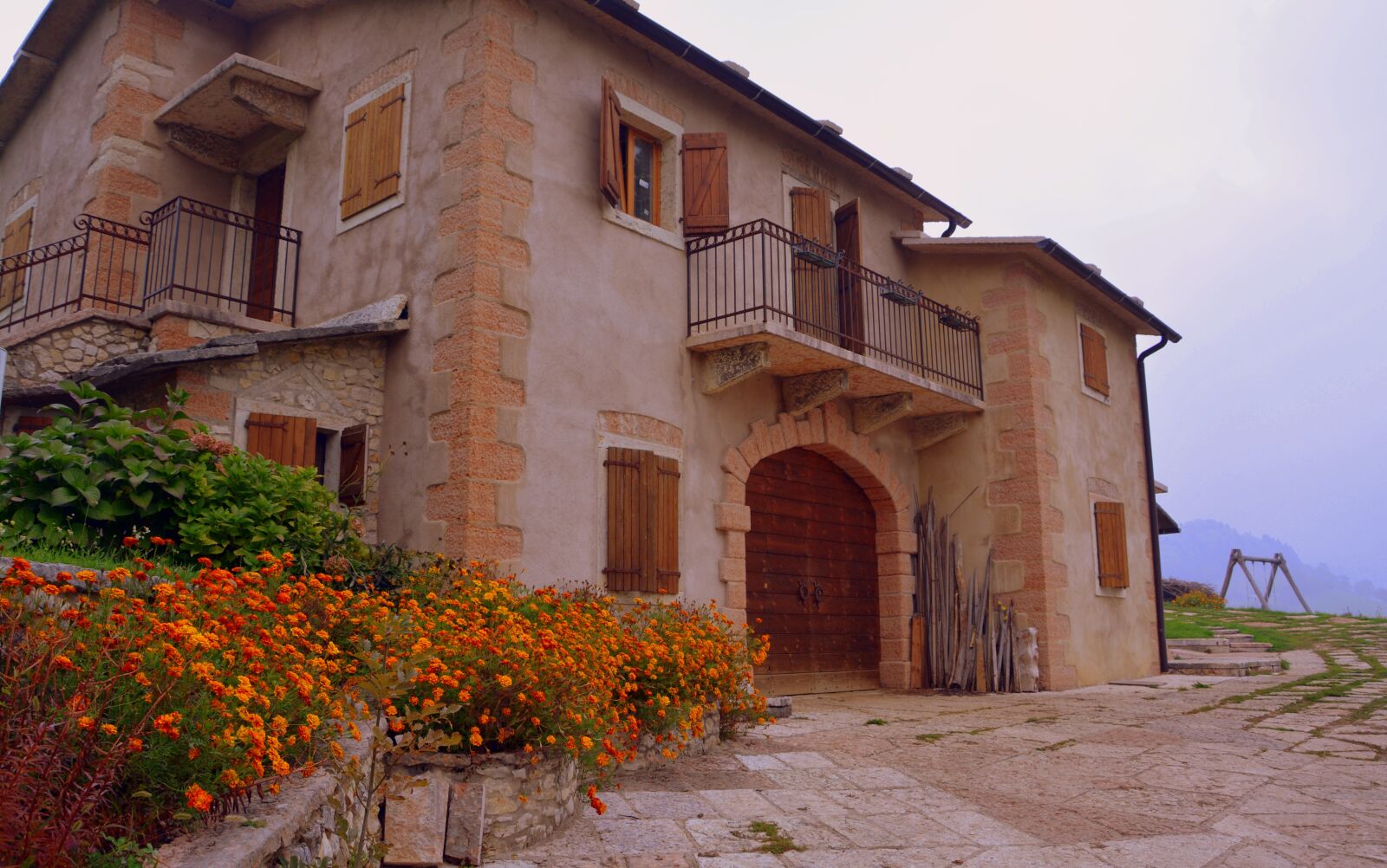 Nikon D7100 sample photo. Bloom, house, stone photography