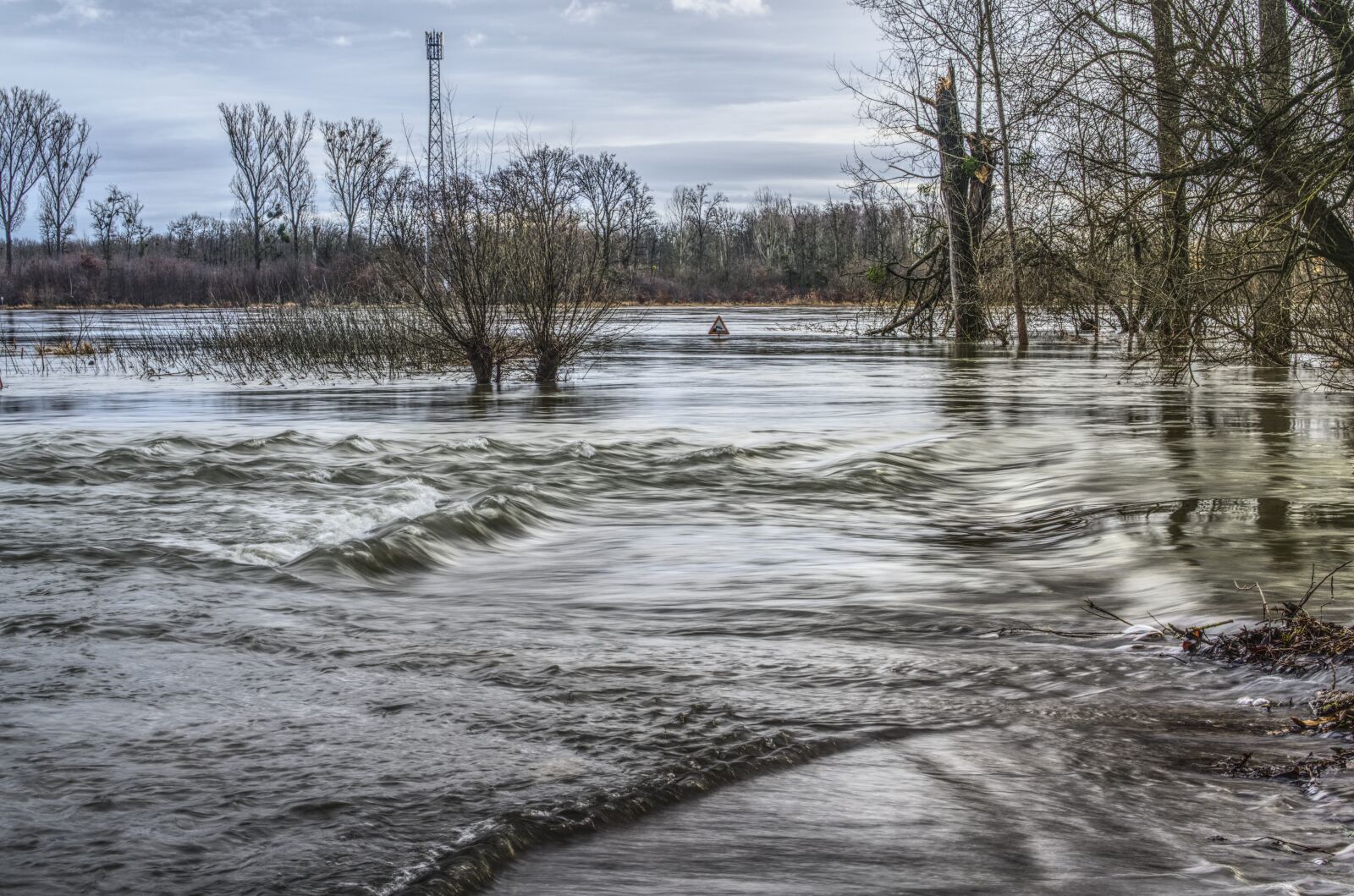 Sony a6000 + Sony E 35mm F1.8 OSS sample photo. High water, flow, river photography