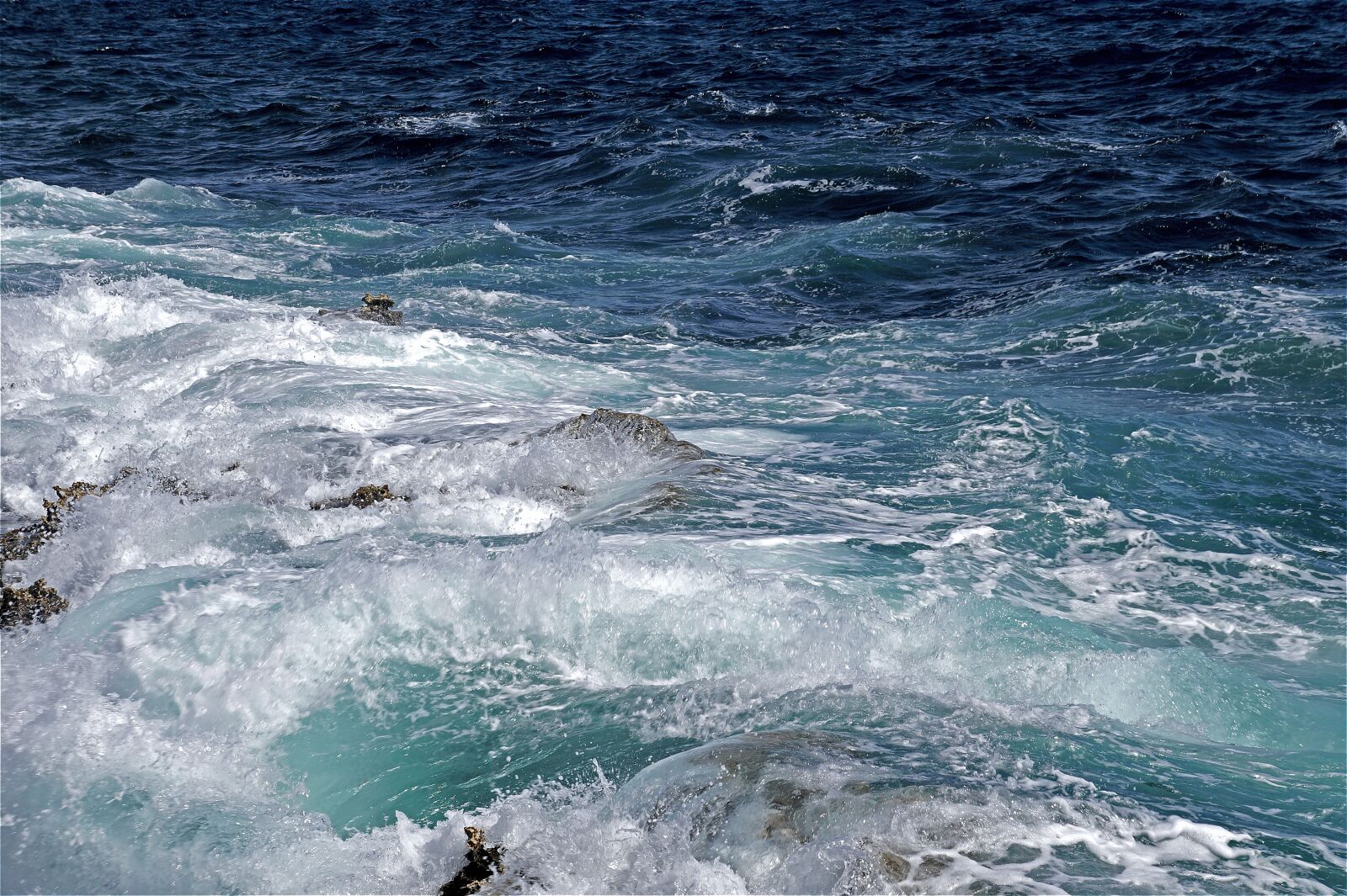 Sony Alpha a3000 sample photo. Blue, rock, sea photography