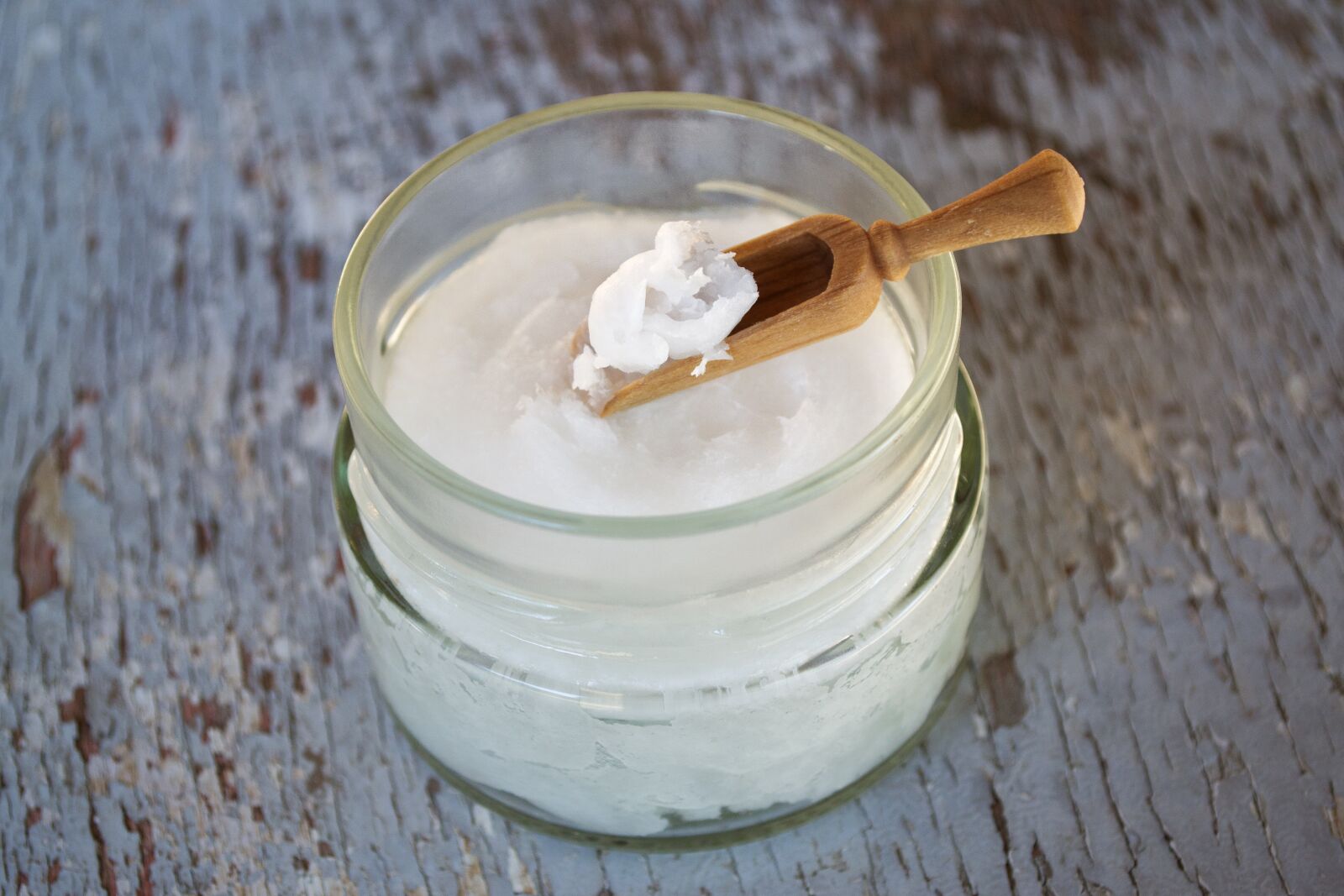Nikon D3100 sample photo. Coconut oil on wooden photography