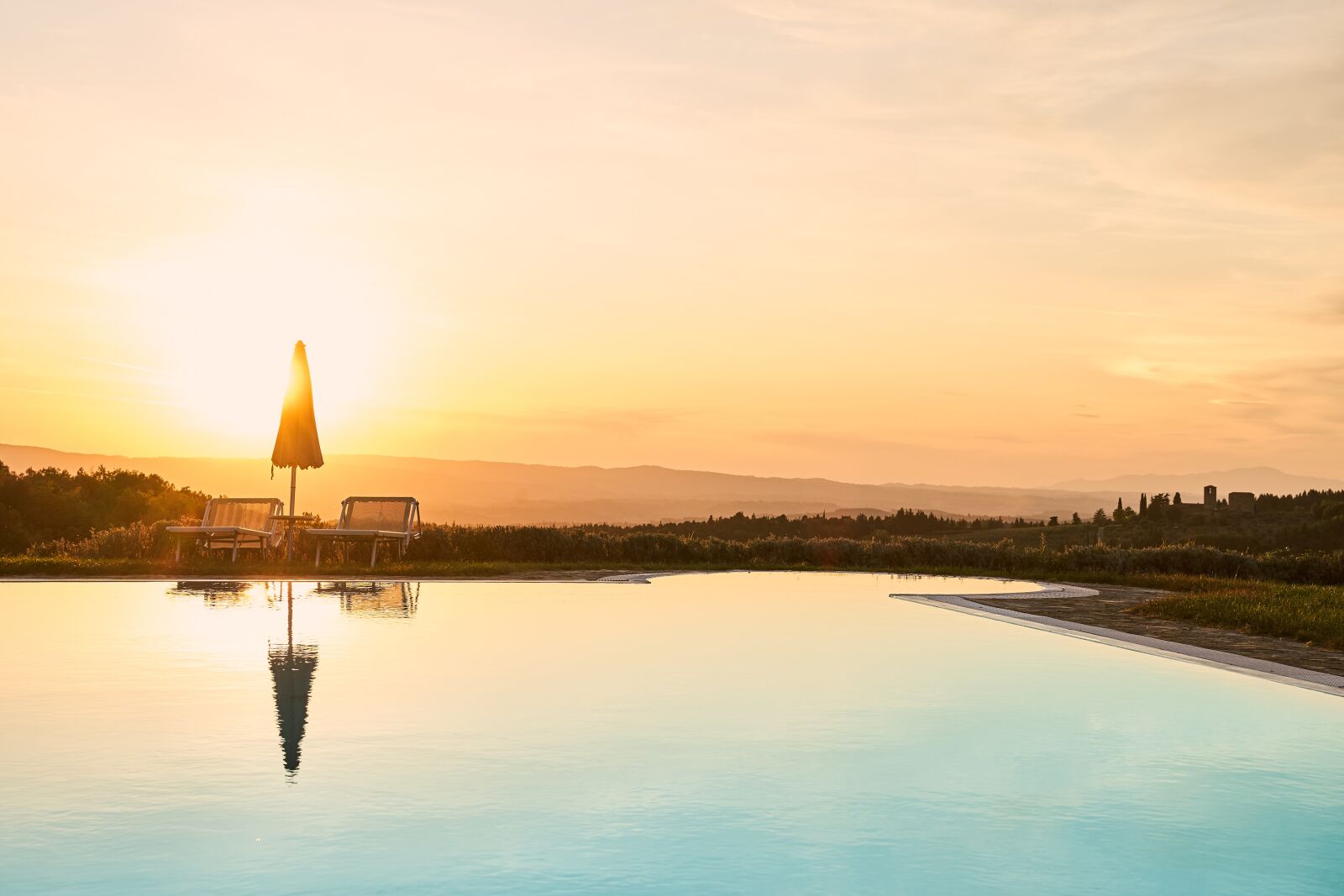 Sony a7 III + Tamron 28-75mm F2.8 Di III RXD sample photo. Pool, sunset, water photography