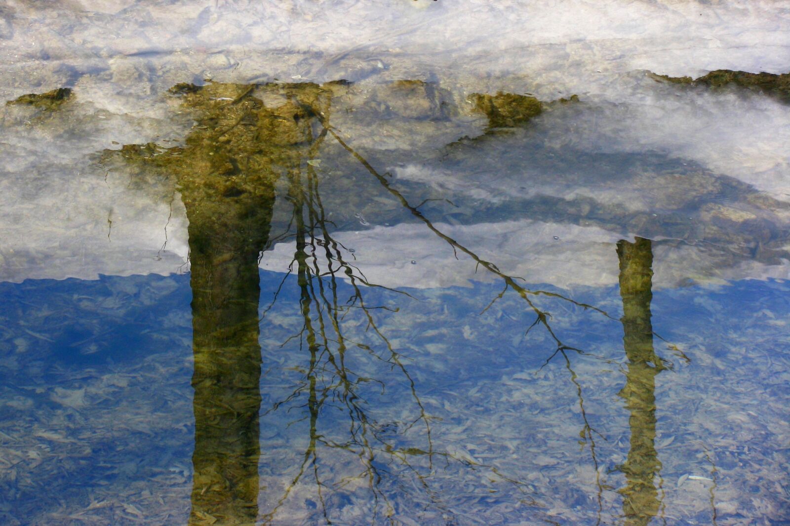 Canon POWERSHOT SX100 IS sample photo. Snow, water, reflection photography