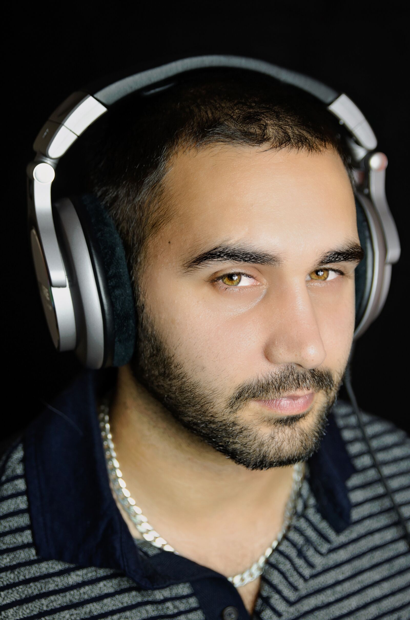 Nikon D7000 sample photo. Man, headphones, music photography