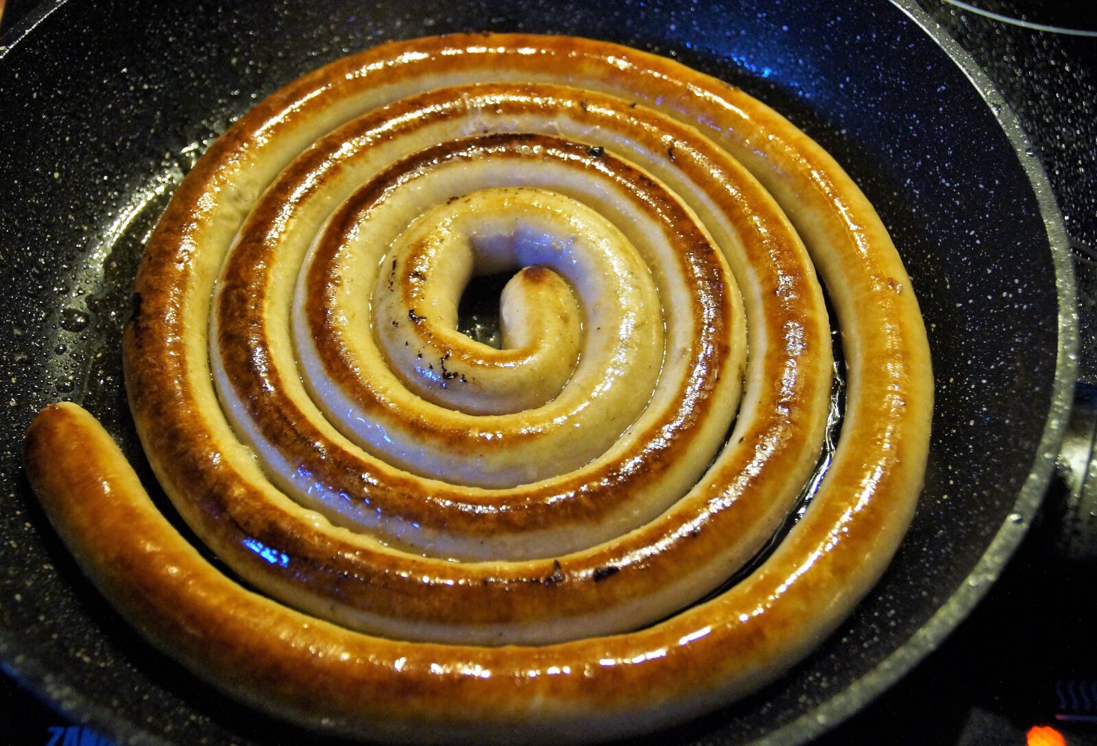 Sony SLT-A58 sample photo. Guilty, sausage, white photography