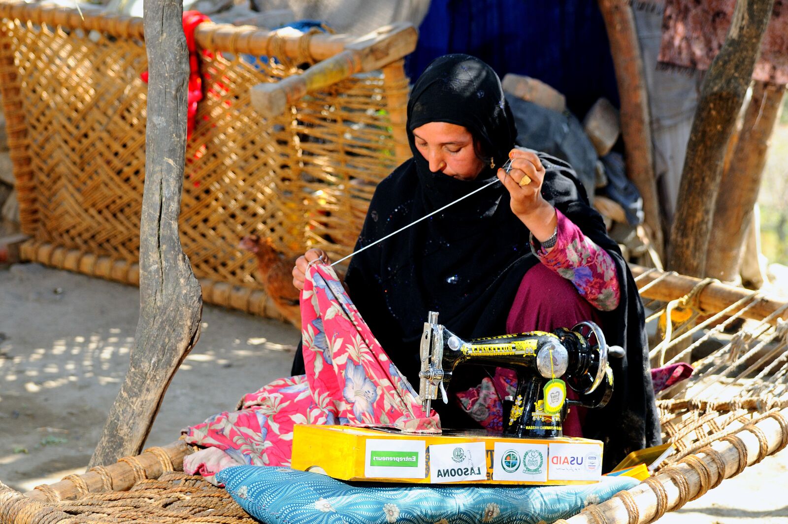 Nikon D300 sample photo. Lady, sewing machine photography