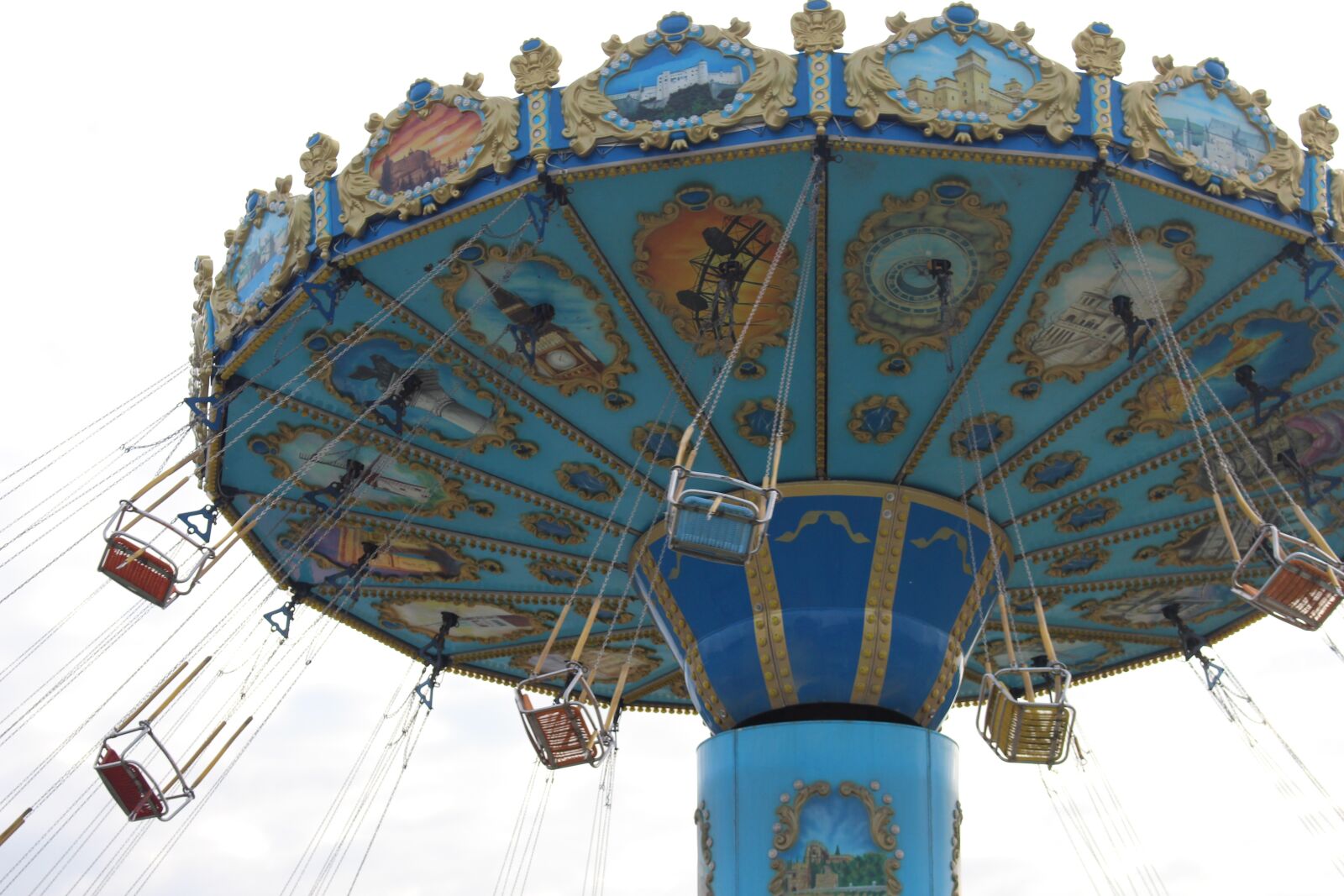 Canon EOS 700D (EOS Rebel T5i / EOS Kiss X7i) sample photo. Carnival, blue, chair swing photography
