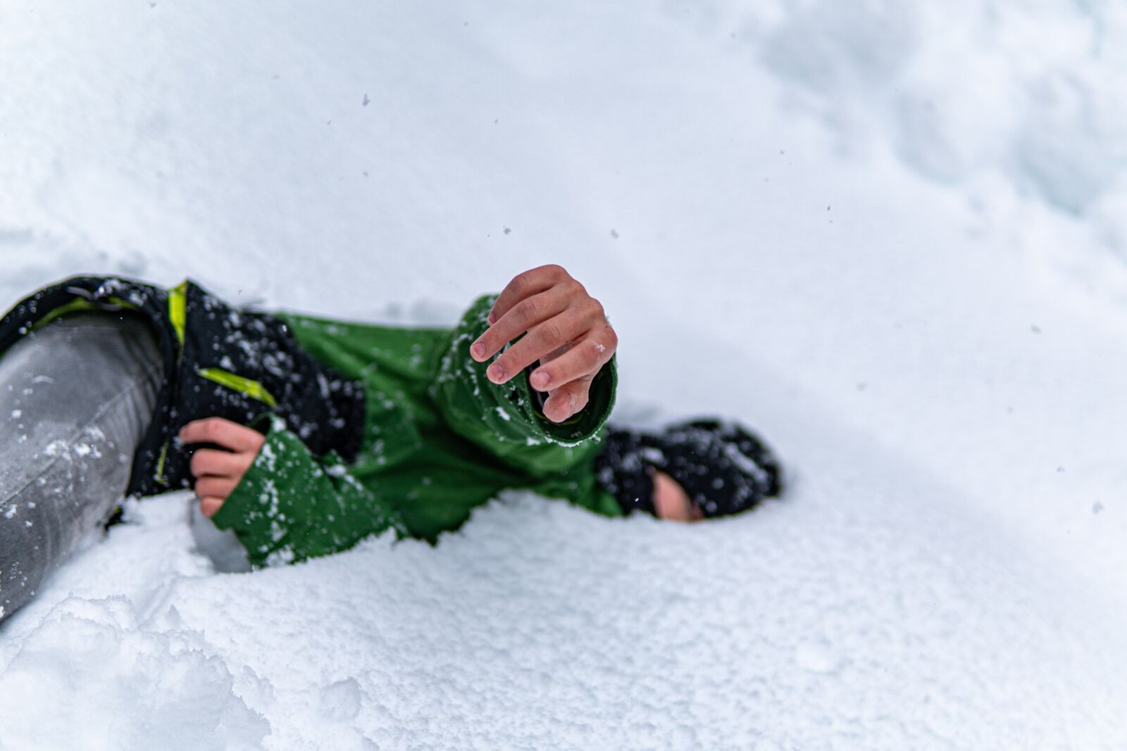 Sony a6300 + 30mm F1.4 DC DN | Contemporary 016 sample photo. Boy, snow, playing photography