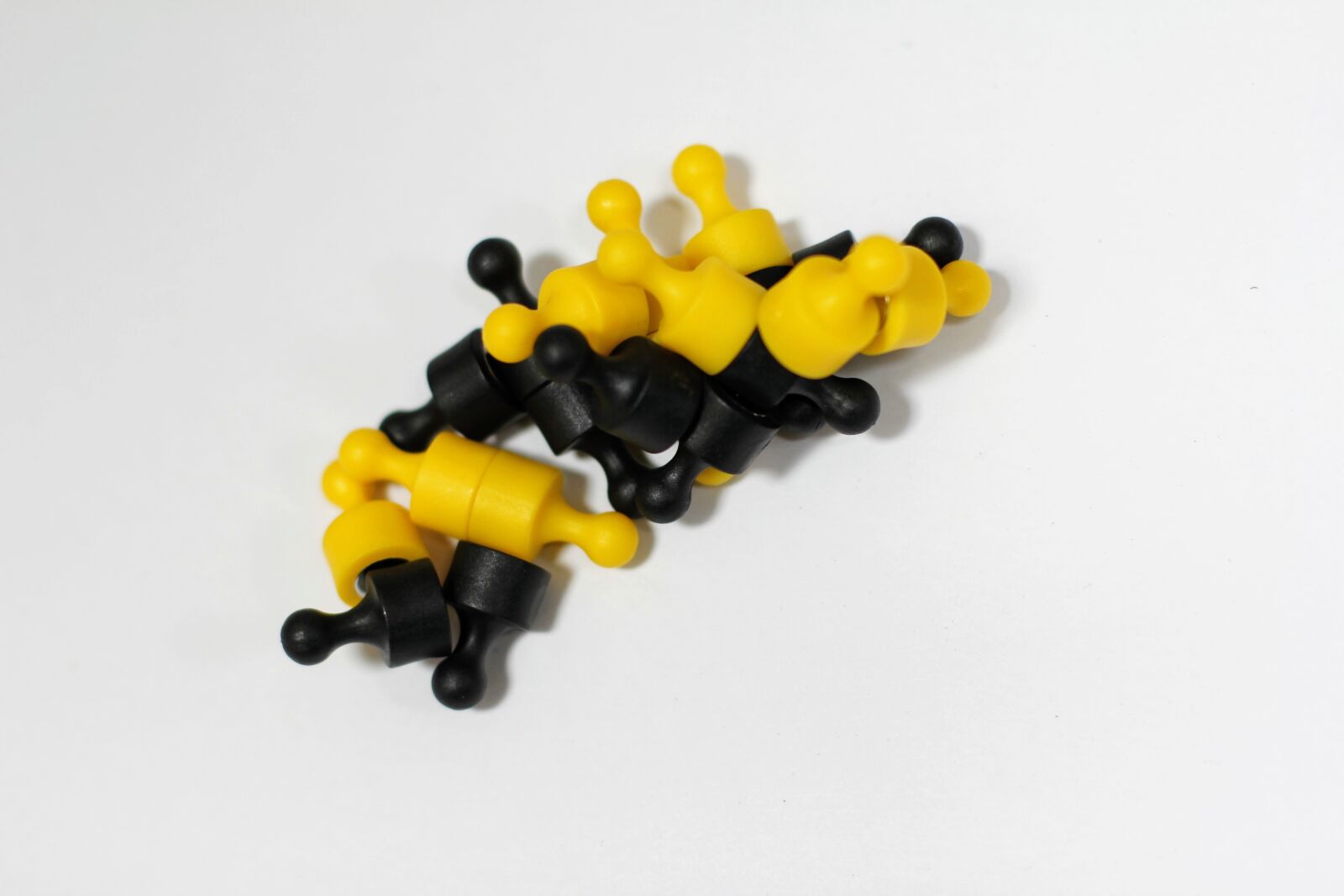 Canon EOS 60D + Canon EF 50mm F1.4 USM sample photo. Magnets, black, yellow photography