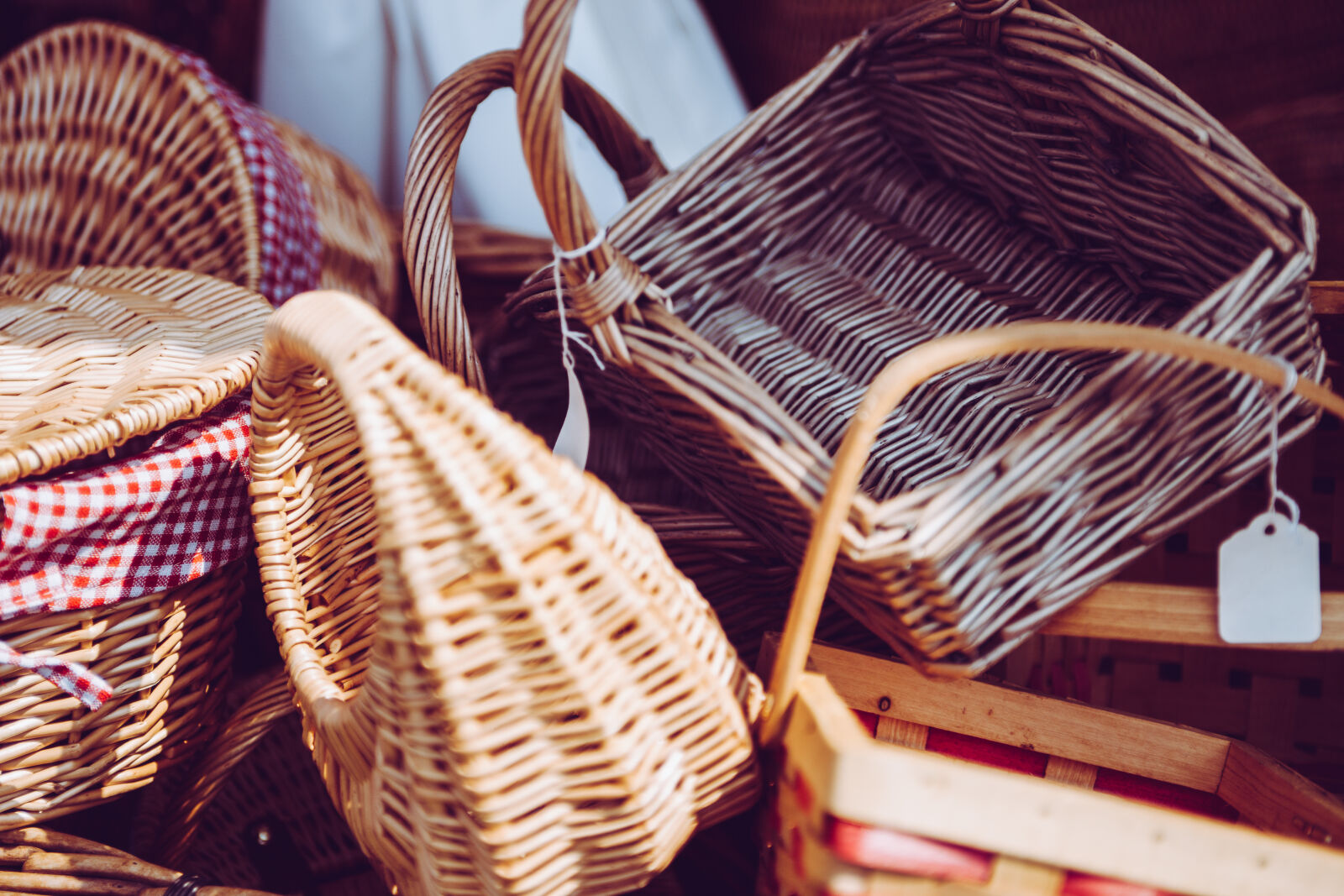 Canon EF 28-70mm f/2.8L USM sample photo. Stacked, brown, wicker, baskets photography