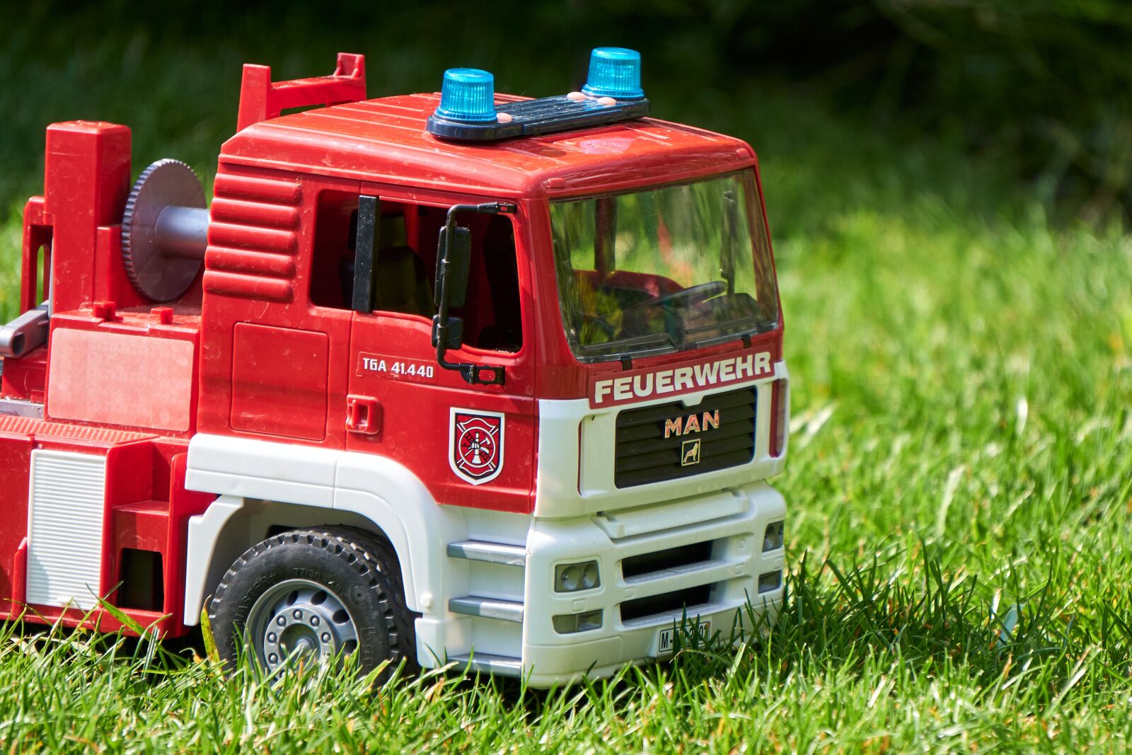 Sony E 55-210mm F4.5-6.3 OSS sample photo. Fire, toys, blue light photography