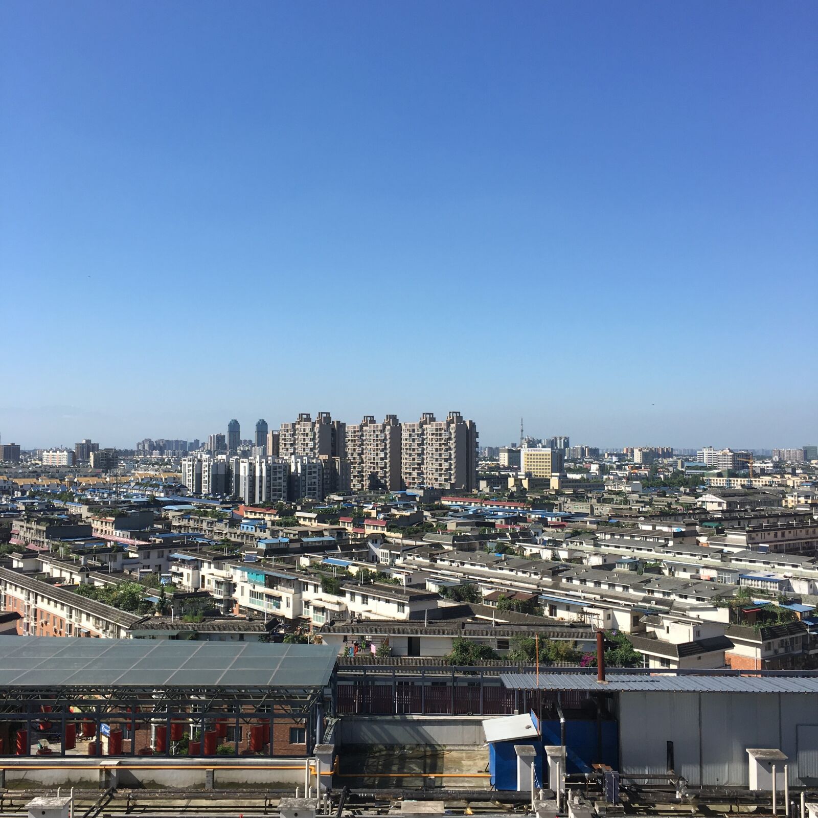 Apple iPhone 6s sample photo. City, blue sky, wenjiang photography