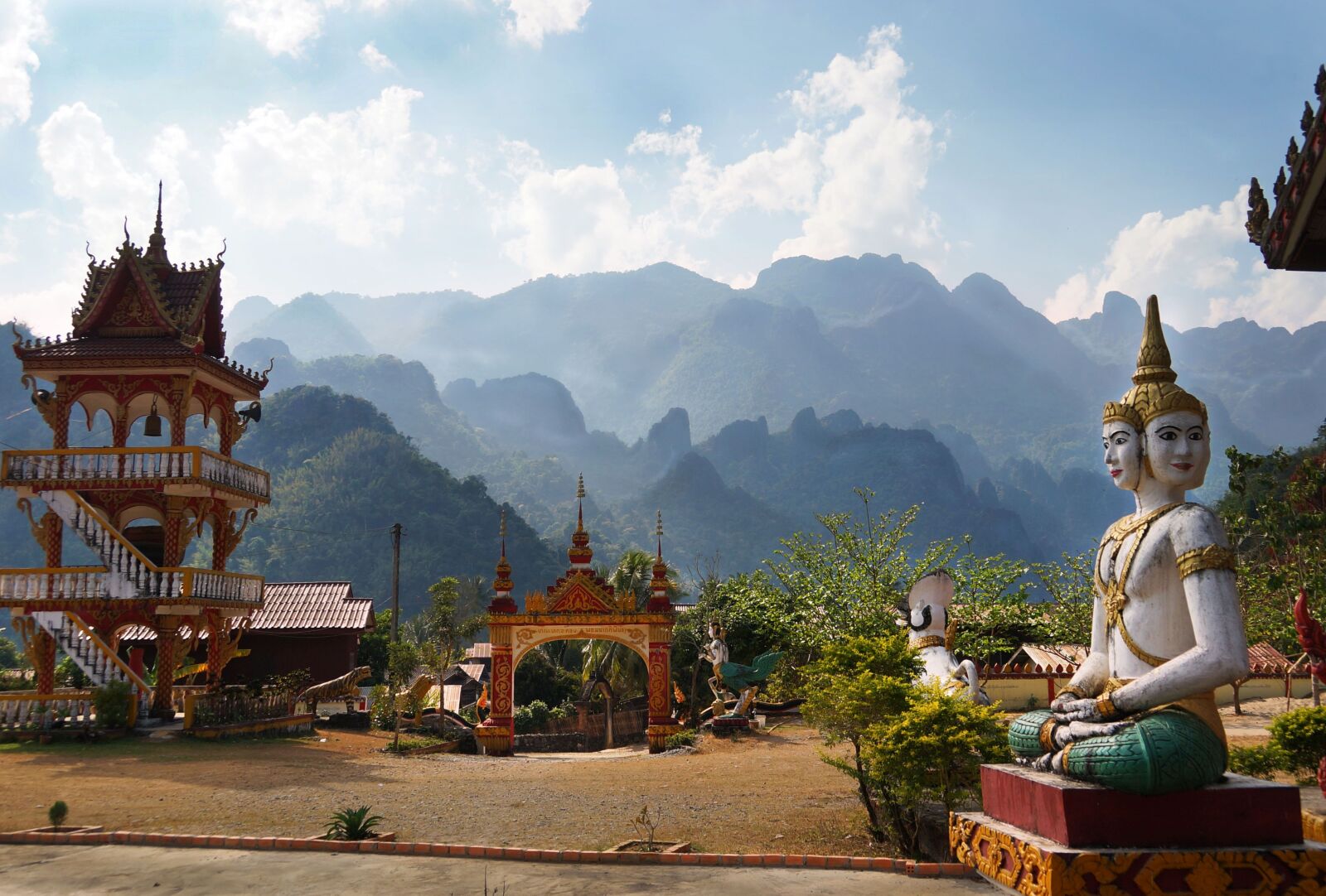 Sony NEX-VG900 sample photo. Laos, temple, mountains photography