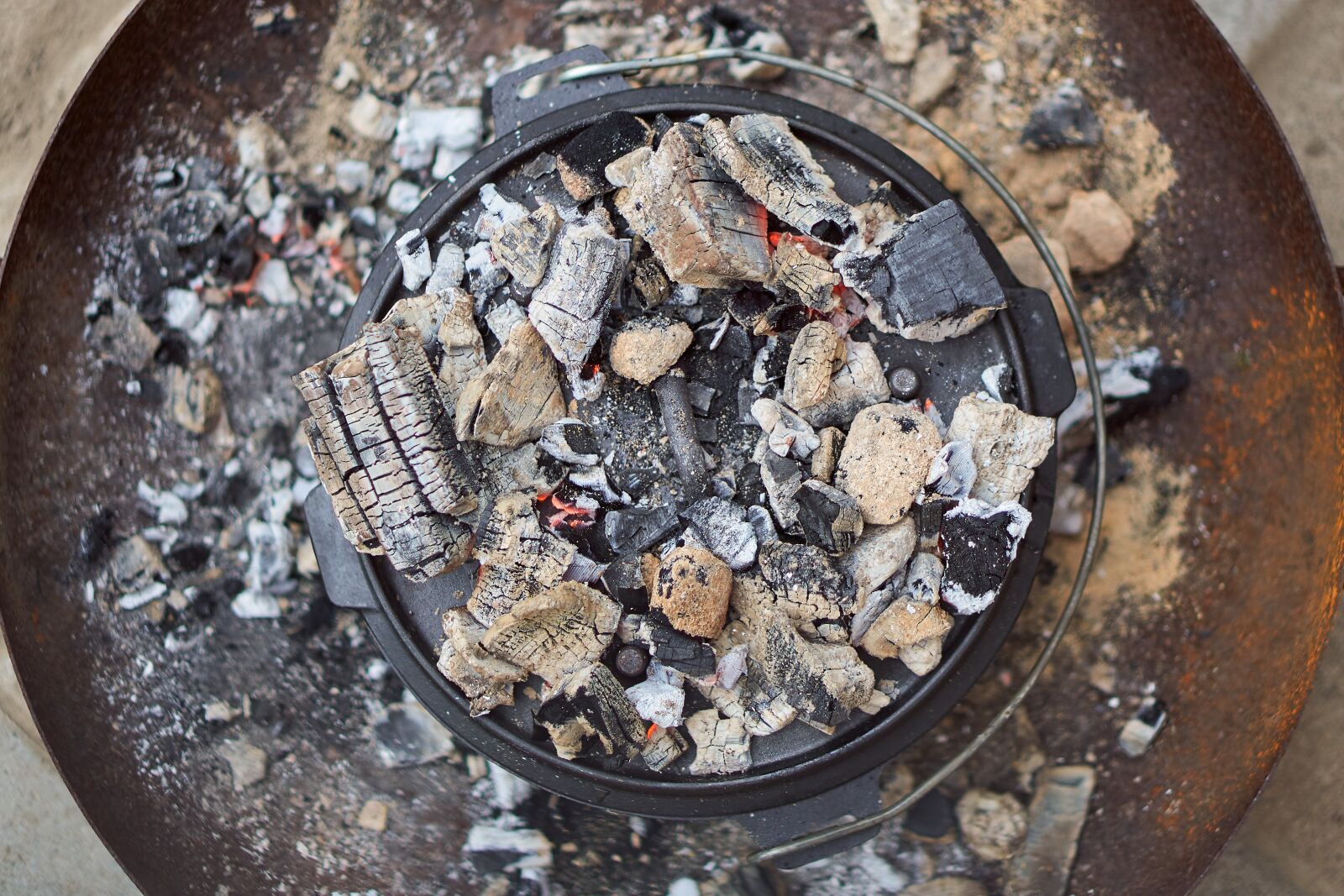 Sony E 50mm F1.8 OSS sample photo. Dutch oven, fire pot photography