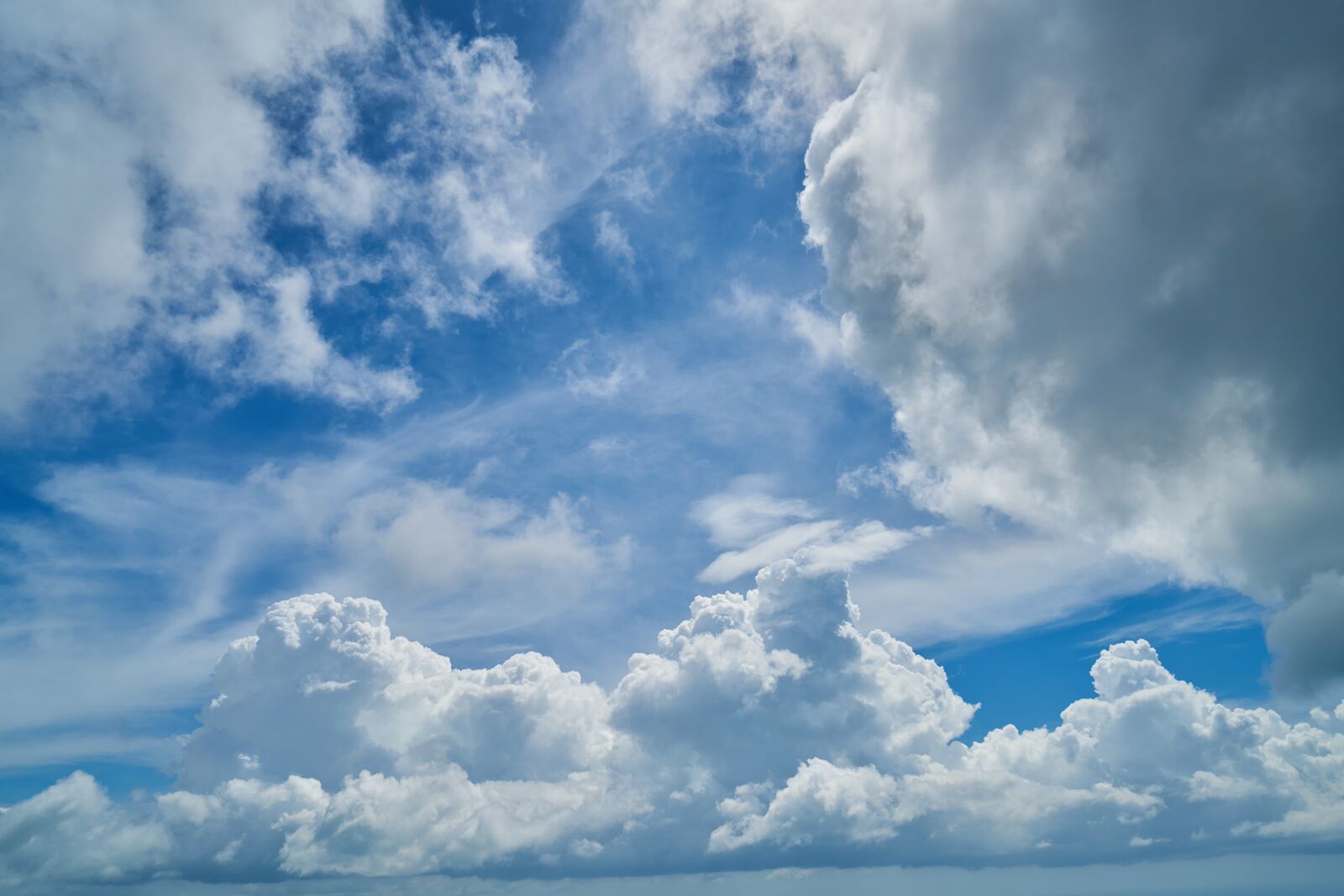 Sony a7R II sample photo. Clouds, blue, white photography