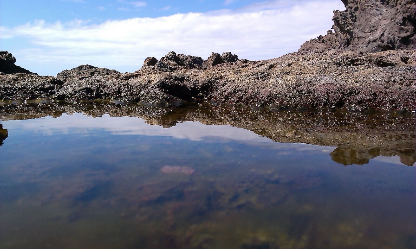 HTC DESIRE 500 sample photo. Pond, rocks, sea photography