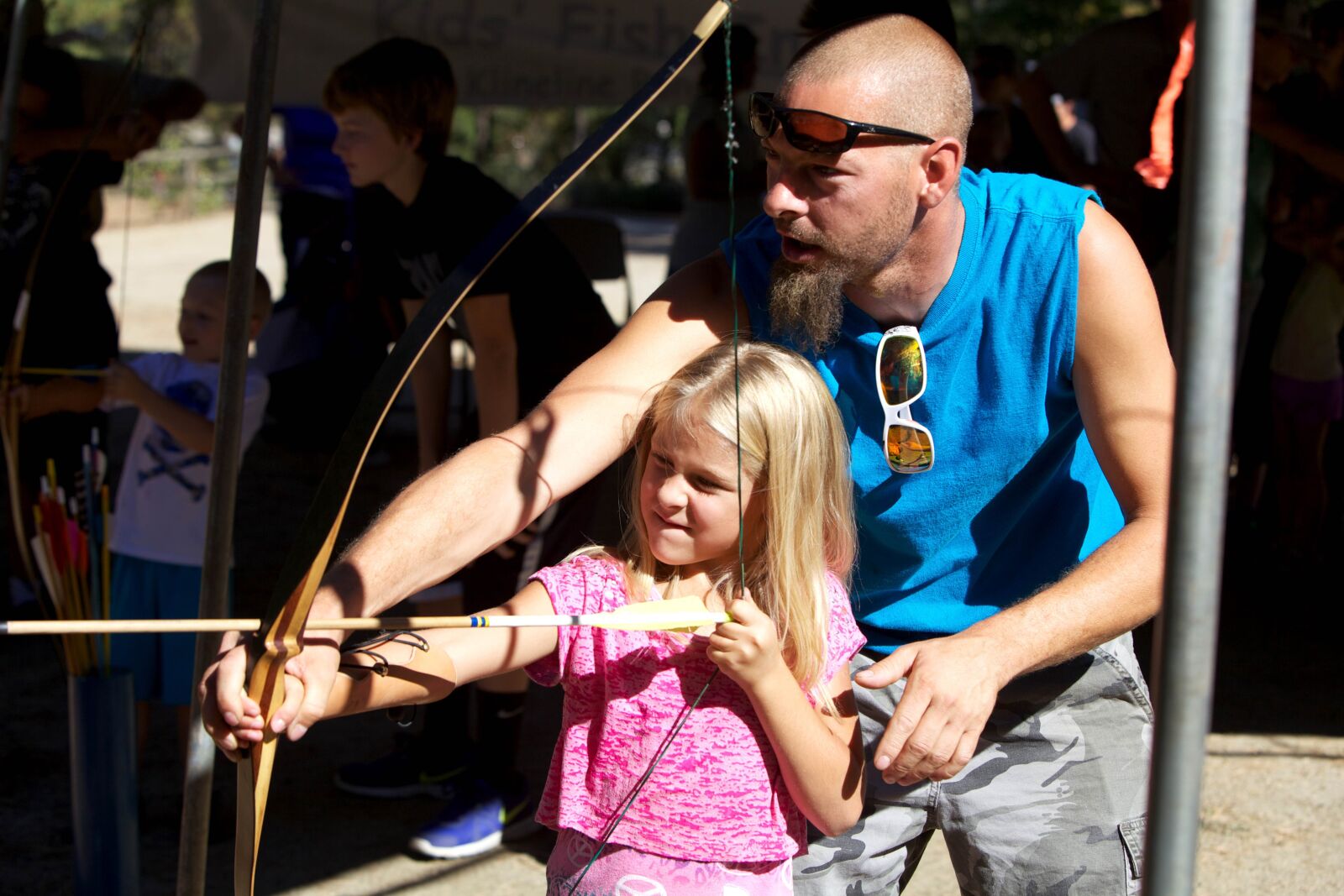Canon EOS 5D Mark II sample photo. Young girl, shooting, bow photography