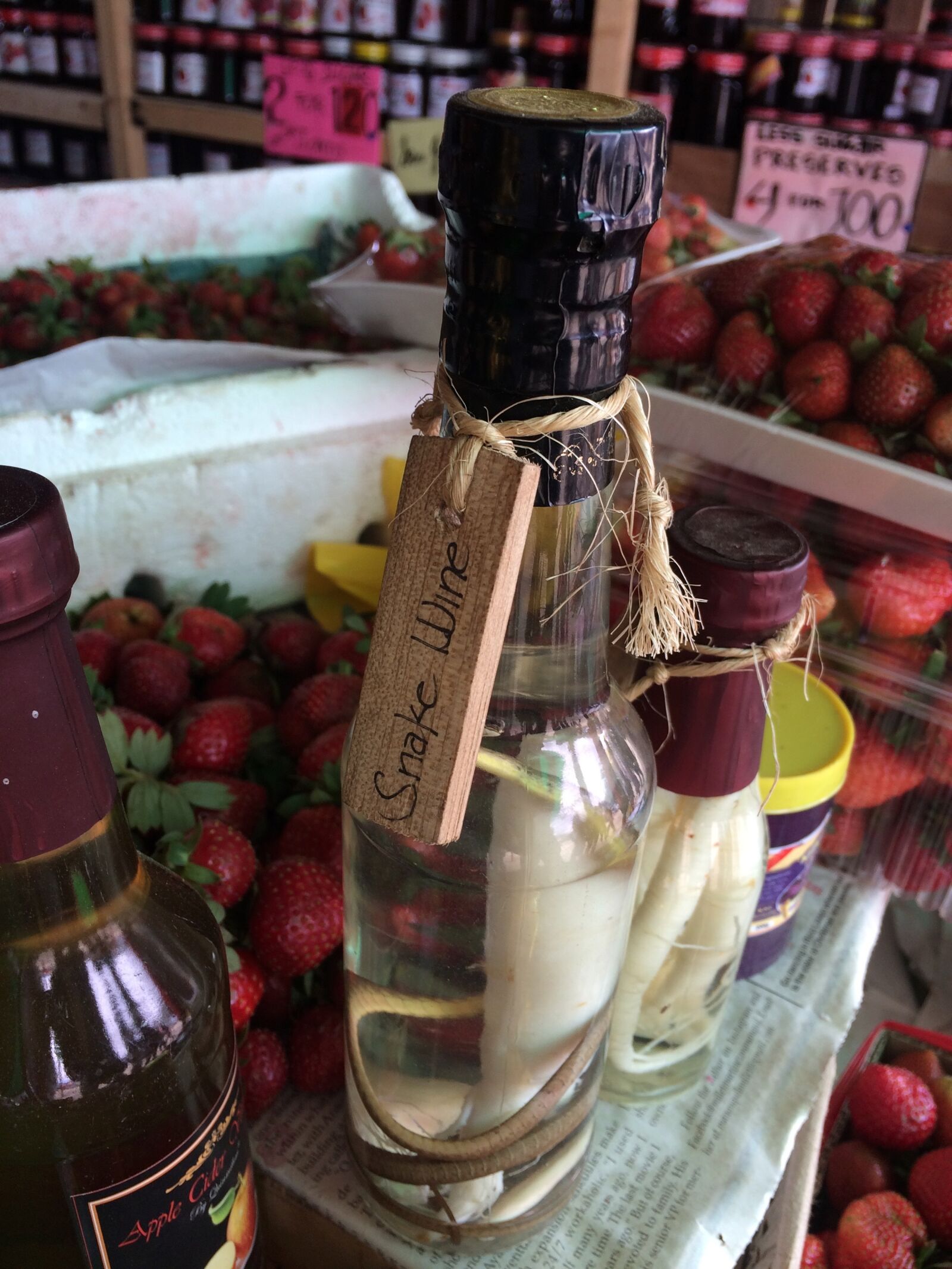 iPhone 5s back camera 4.15mm f/2.2 sample photo. Wine, snake, store photography