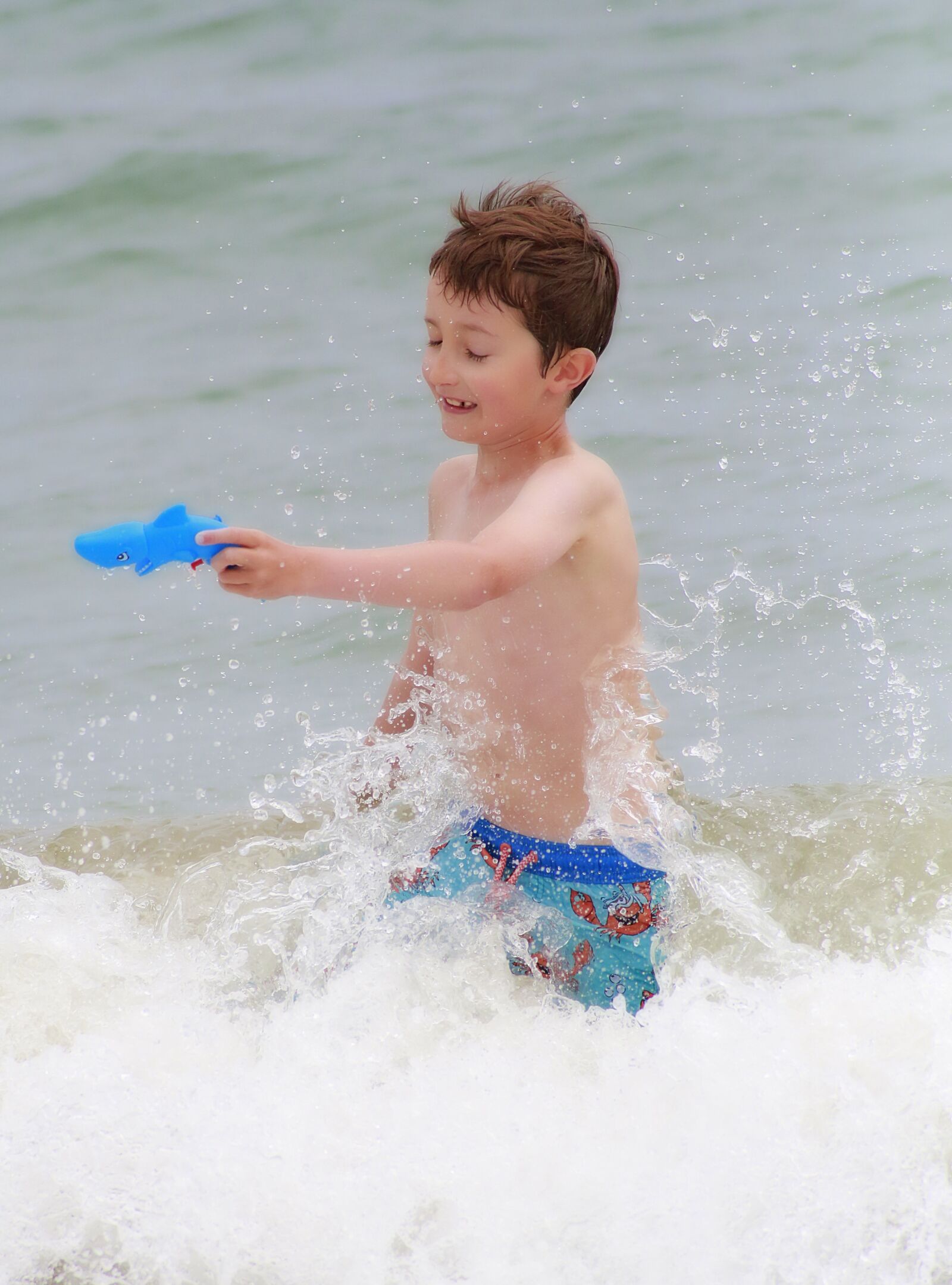Canon EOS 5D Mark III sample photo. Child, beach, games photography