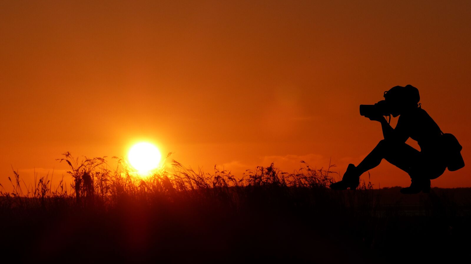 Panasonic Lumix DMC-FZ200 sample photo. Sunset, photographer, nature photography