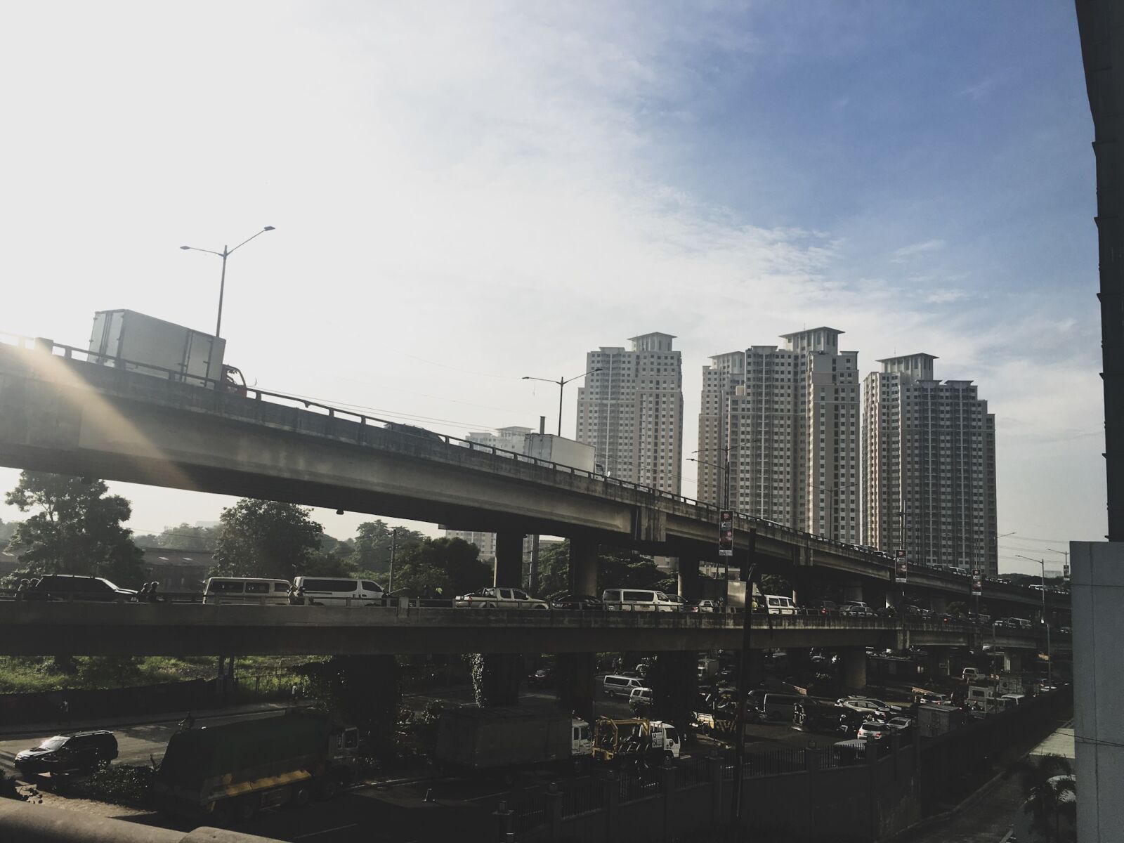 iPhone 6s back camera 4.15mm f/2.2 sample photo. Car, highway, road, traffic photography