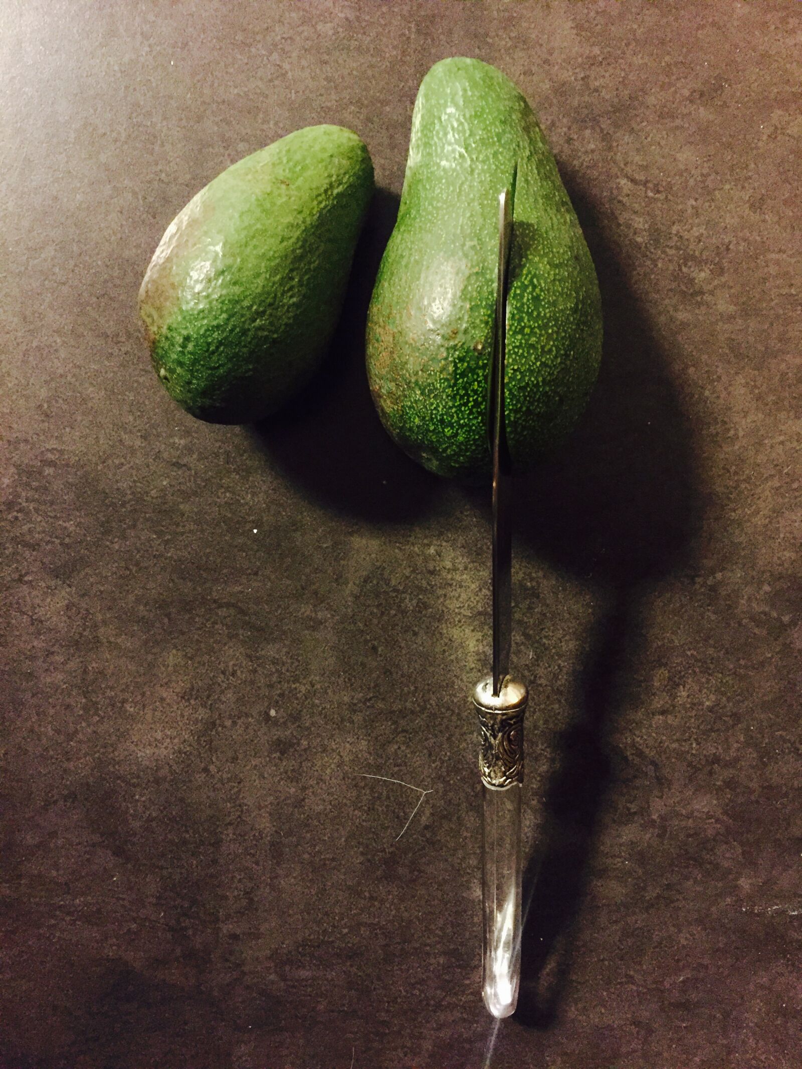 iPhone 6 back camera 4.15mm f/2.2 sample photo. Avocado, knife photography