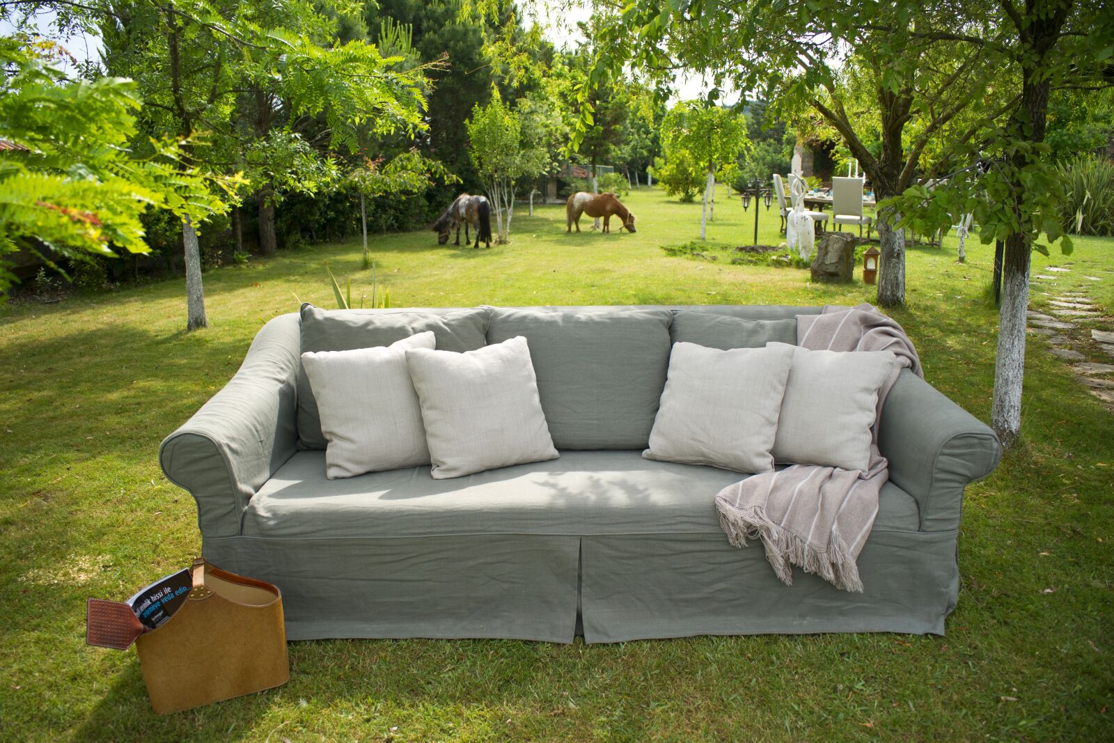 Sony Alpha DSLR-A850 sample photo. Armchair, grass, architecture photography