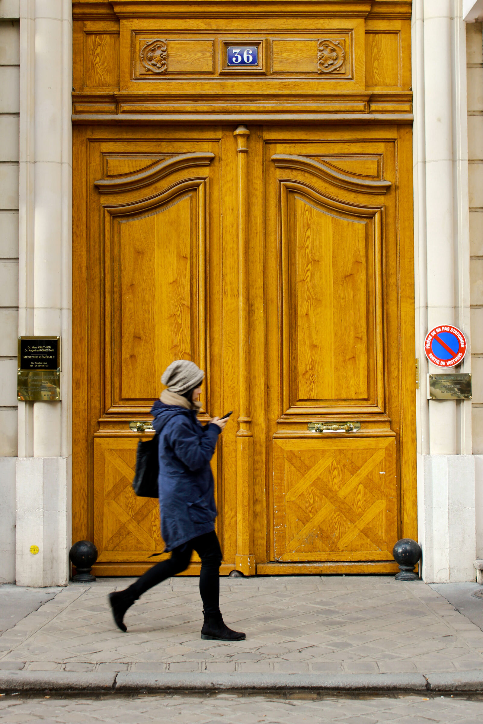 Canon EOS 600D (Rebel EOS T3i / EOS Kiss X5) sample photo. Architecture, door, pavement, person photography