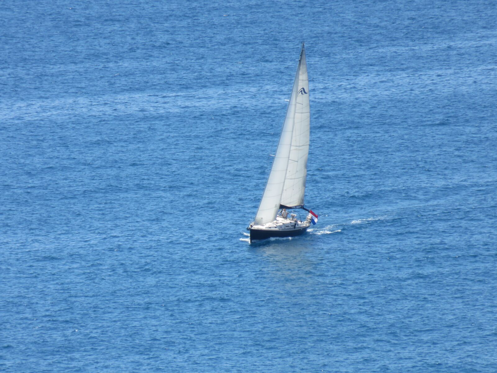 Canon PowerShot SX710 HS sample photo. Sailboat, body of water photography